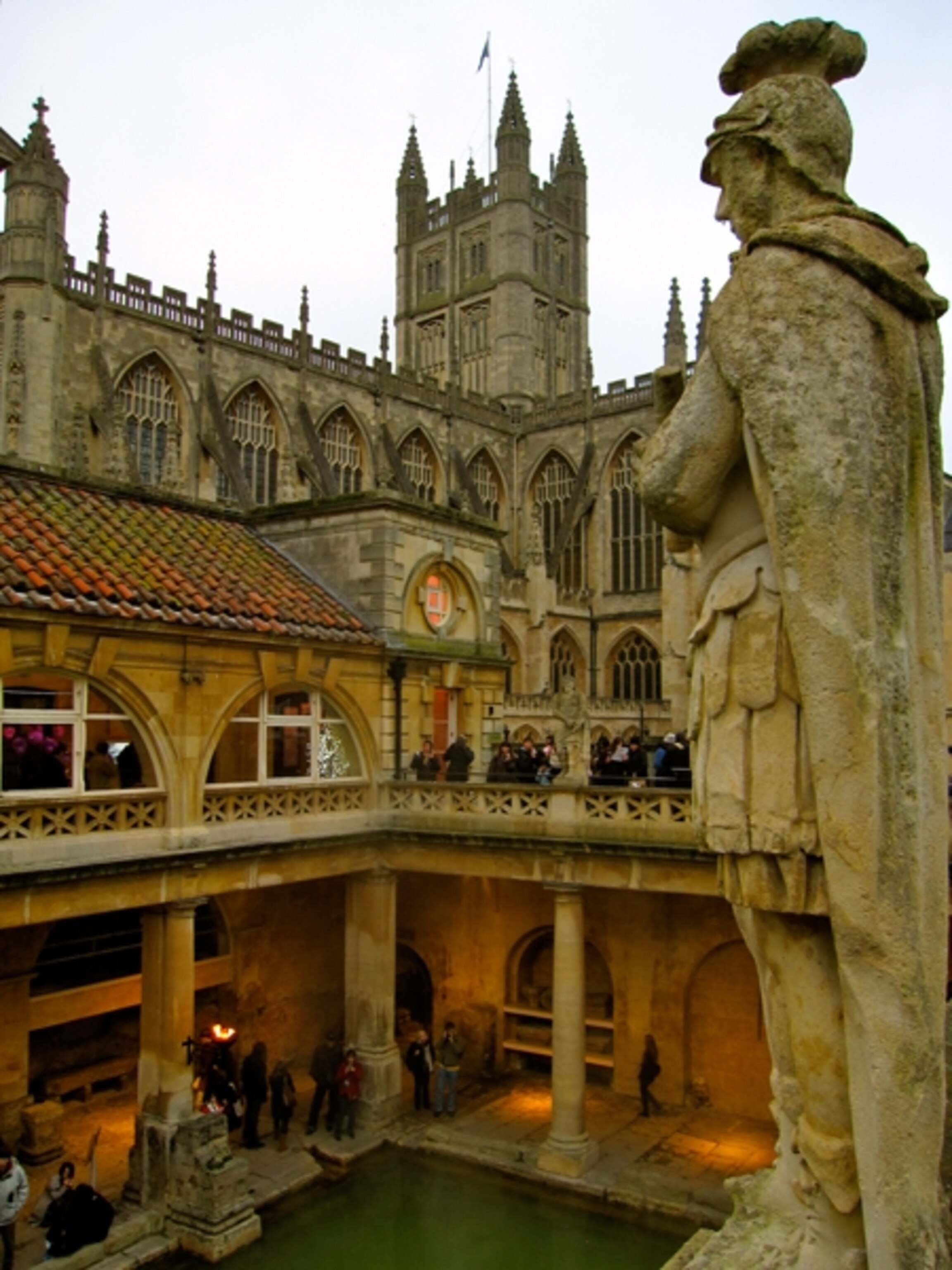 A statue of a Roman soldier overlooking the Roman Baths in Bath, England