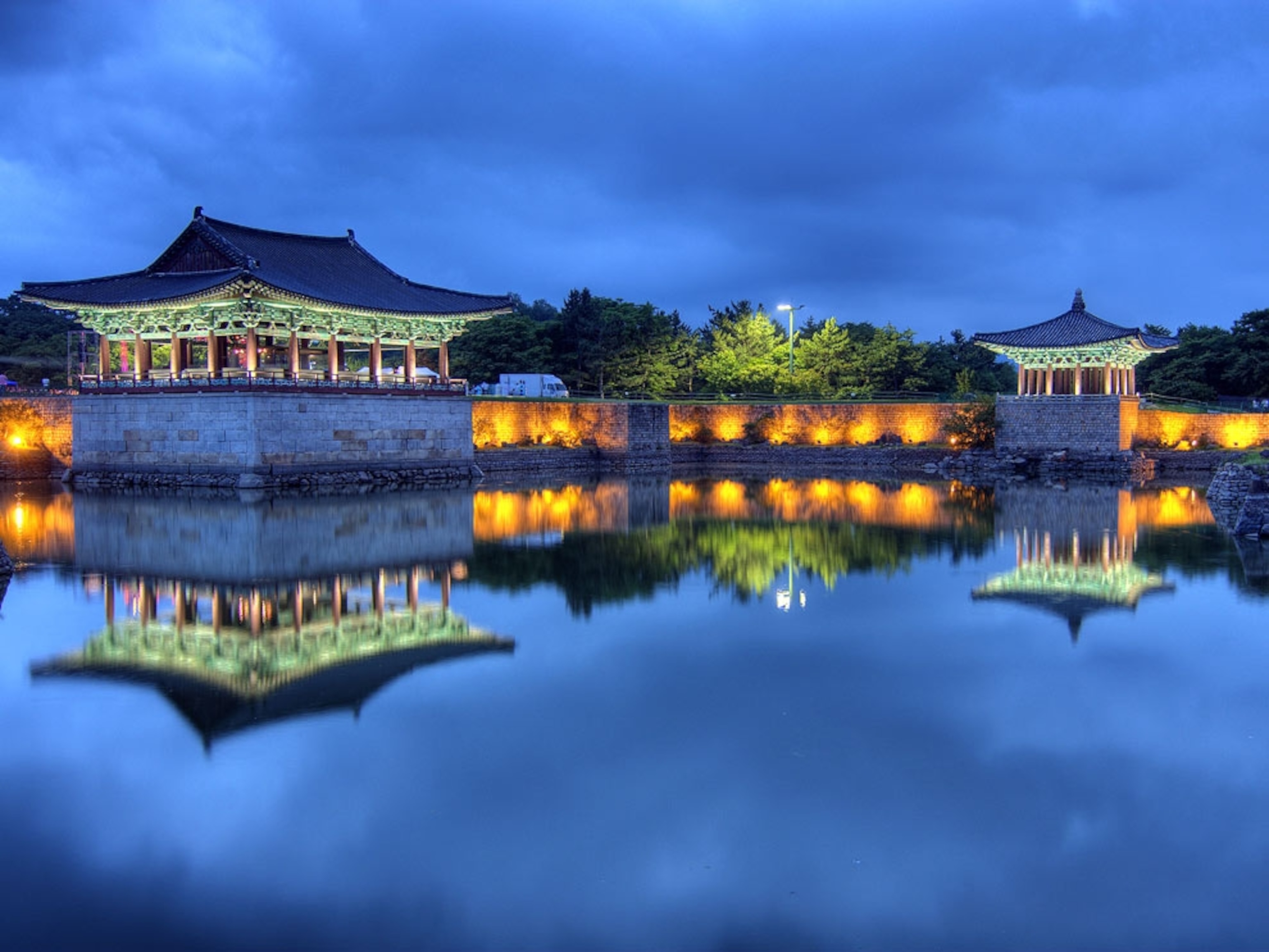 A pond reflecting two classic pagodas