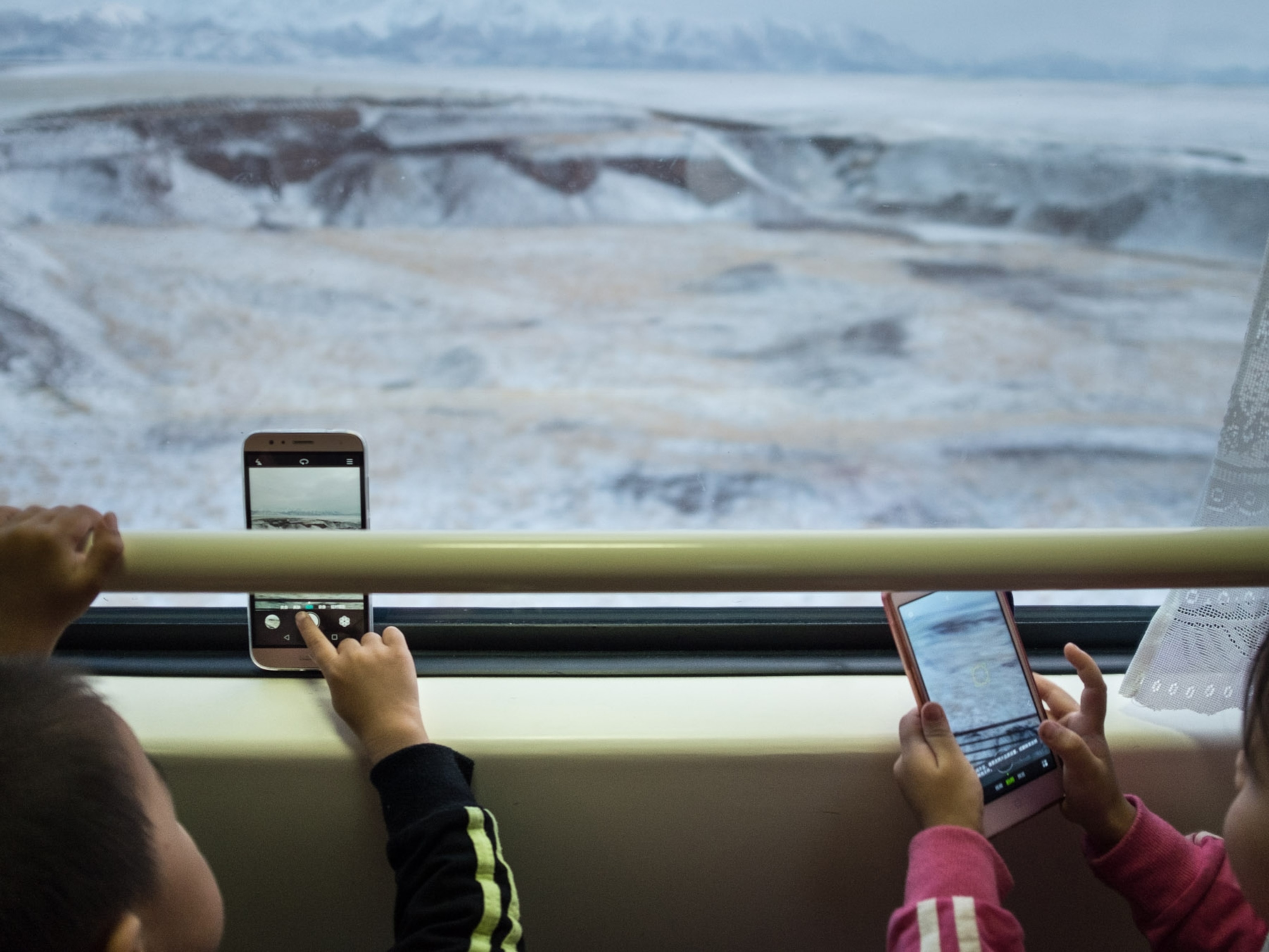 a brother and sister use phones