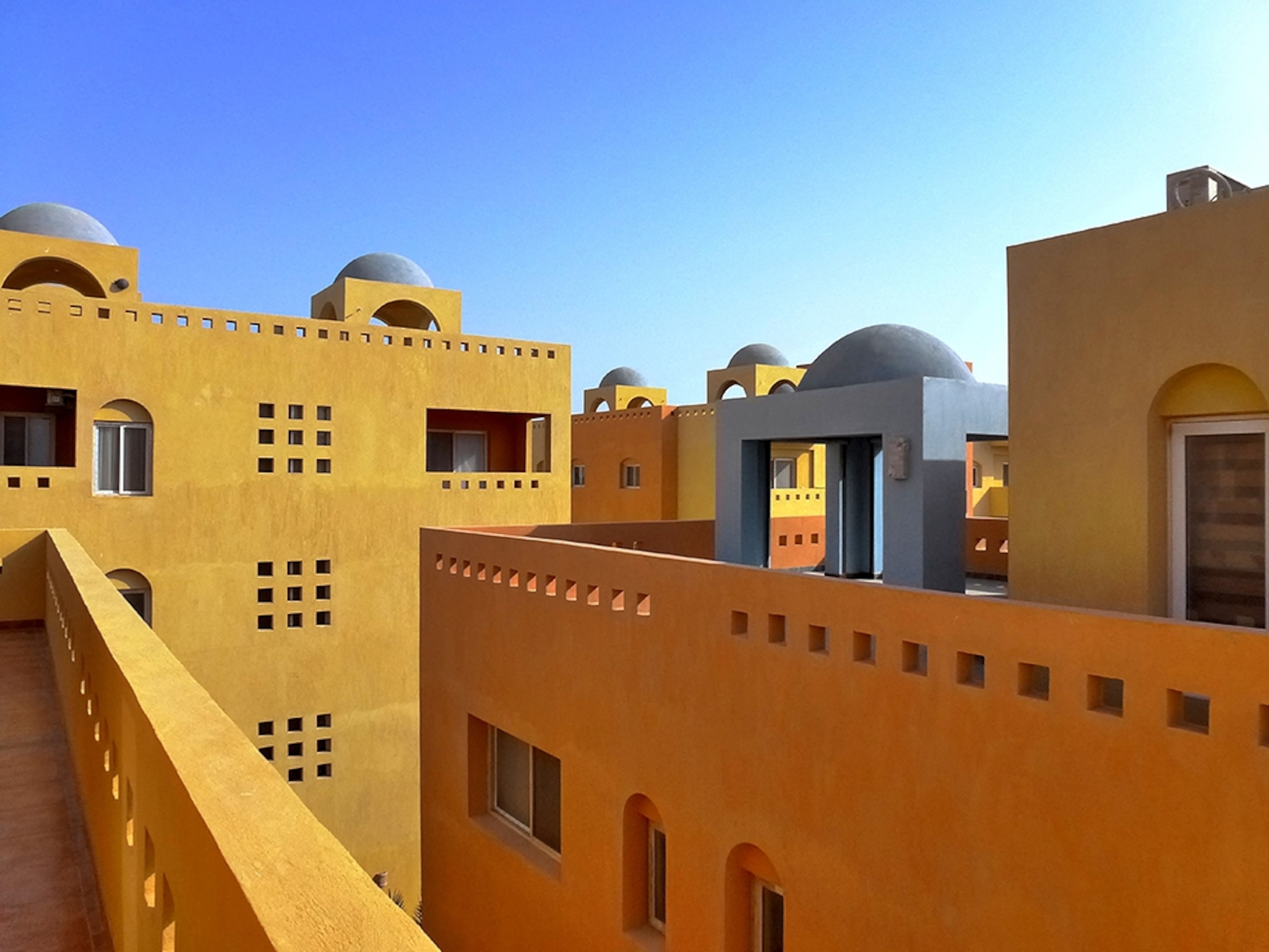 a colorful apartment complex in Hurghada, Egypt