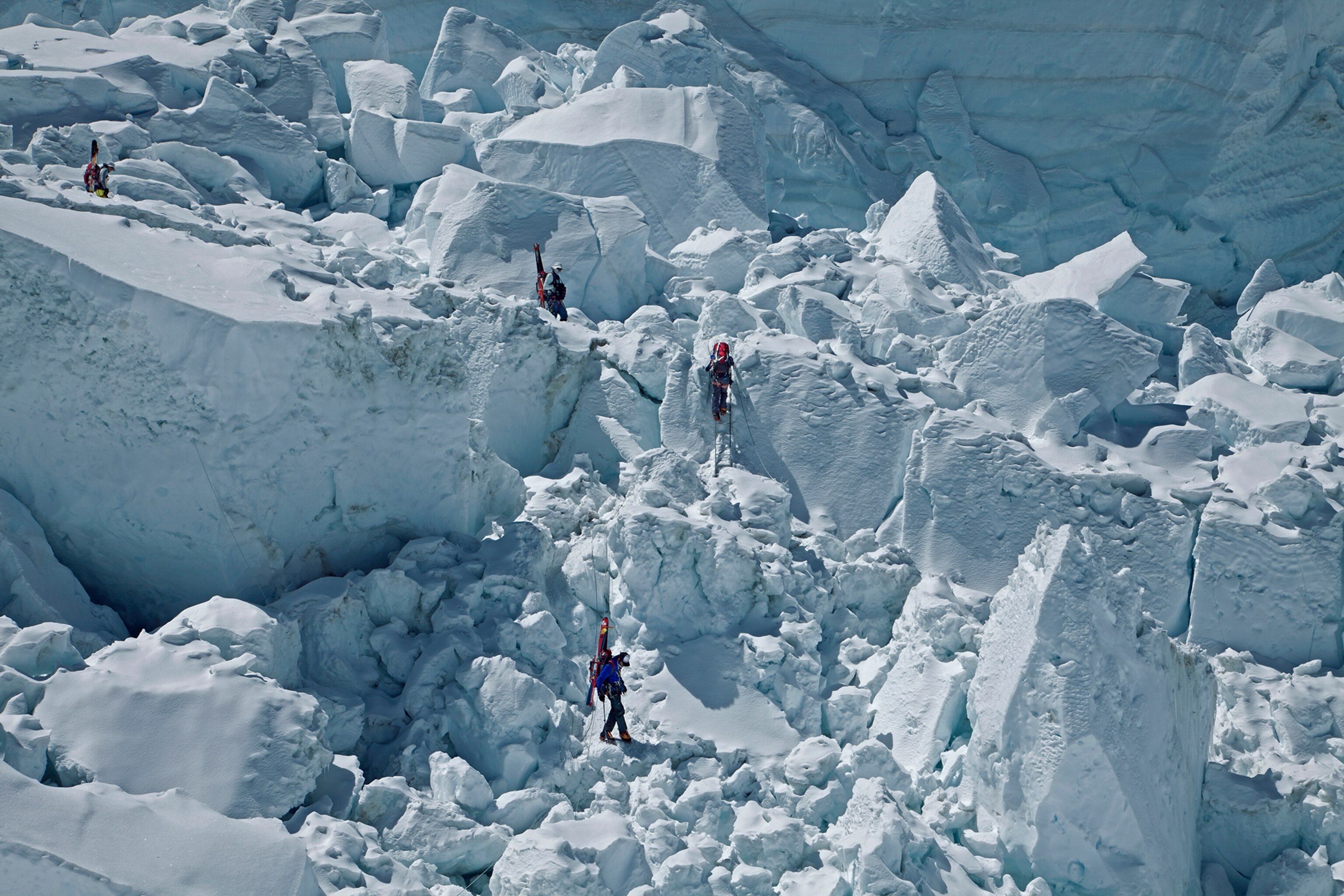 Team decends through the "popcorn" in the Khumbu ice fall.