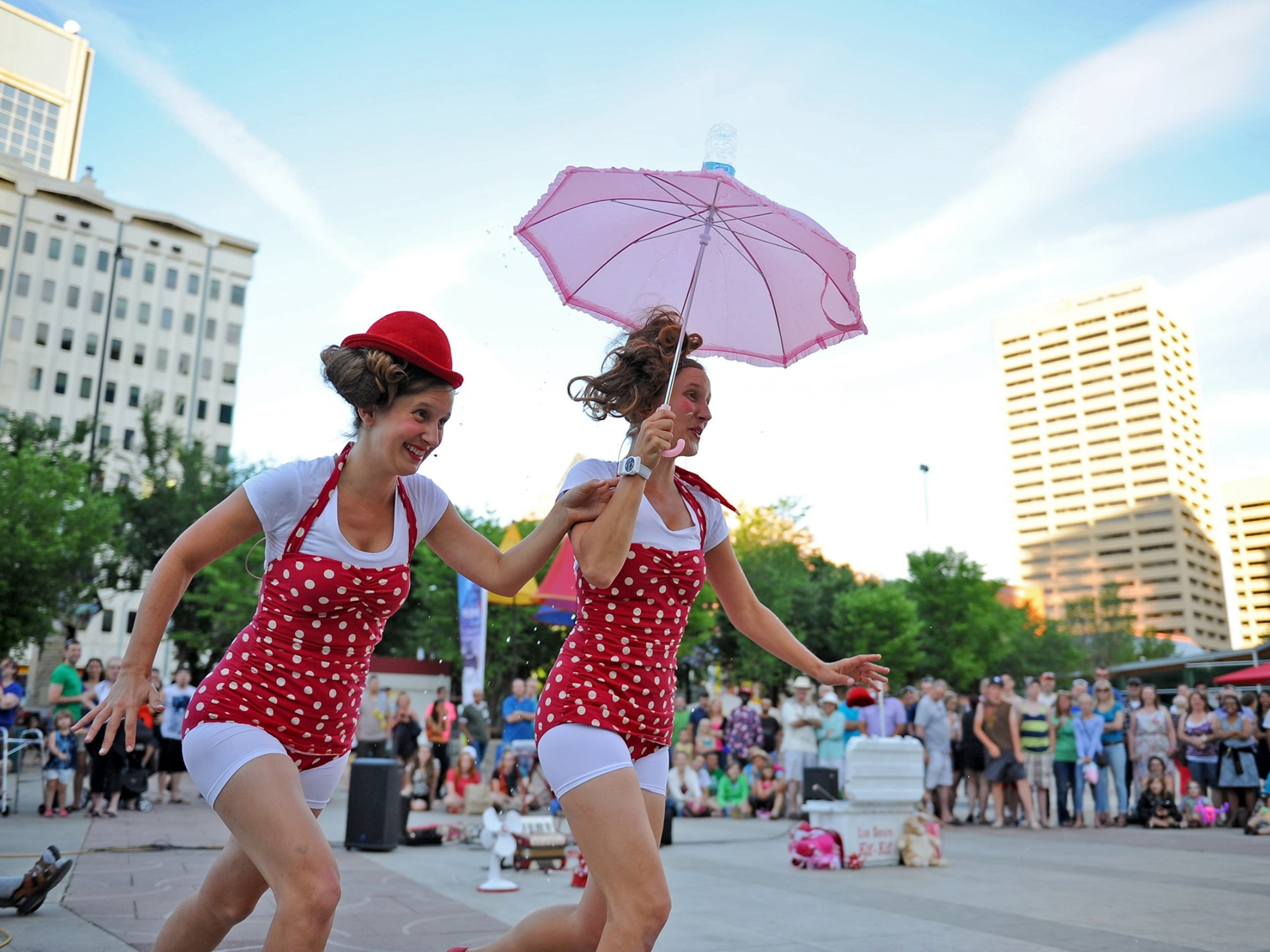 two female street performers at the Edmonton Street Performers Festival, Alberta, Canada