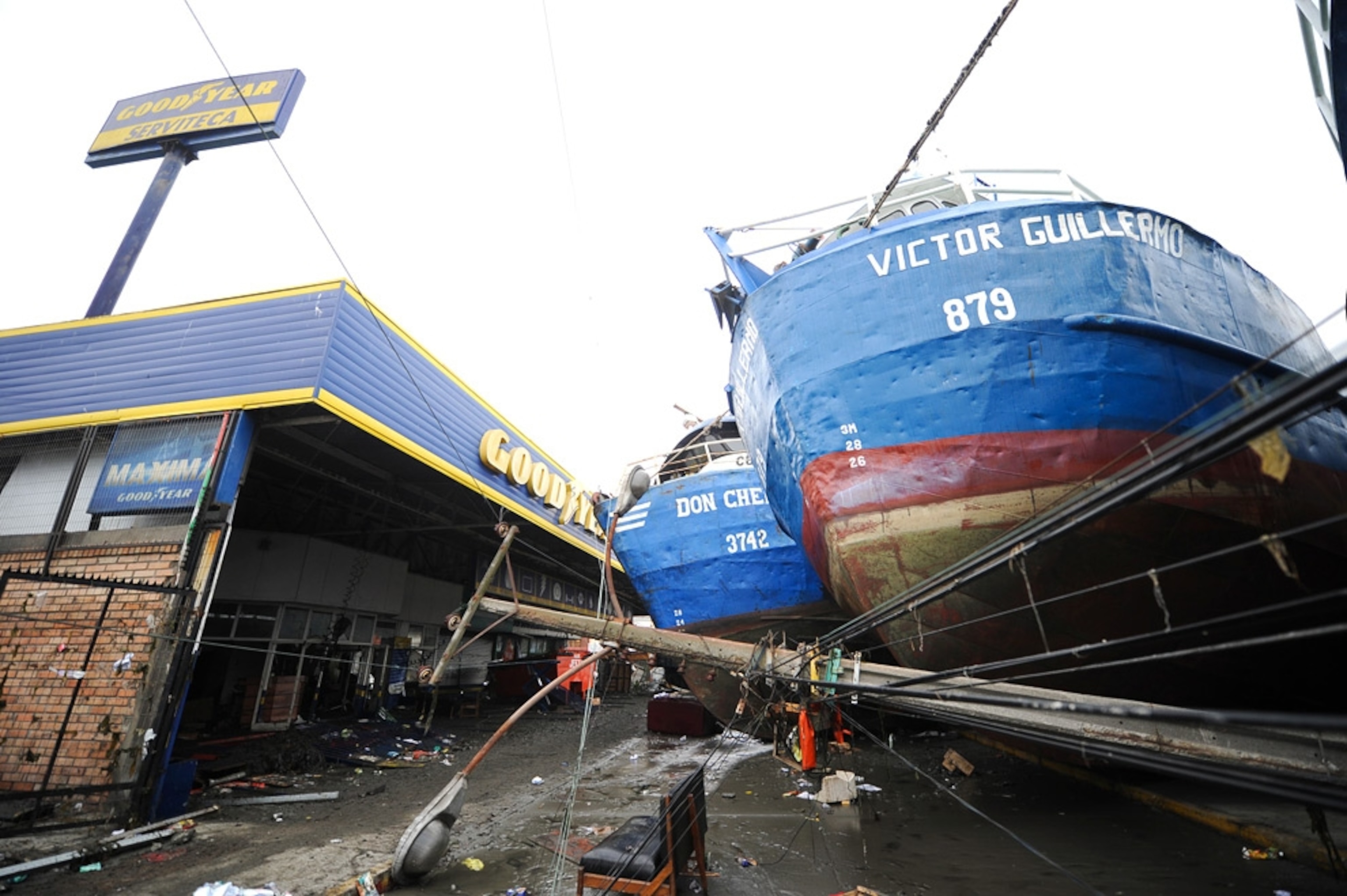 fishing boats tossed by the tsunami after the Chile earthquake
