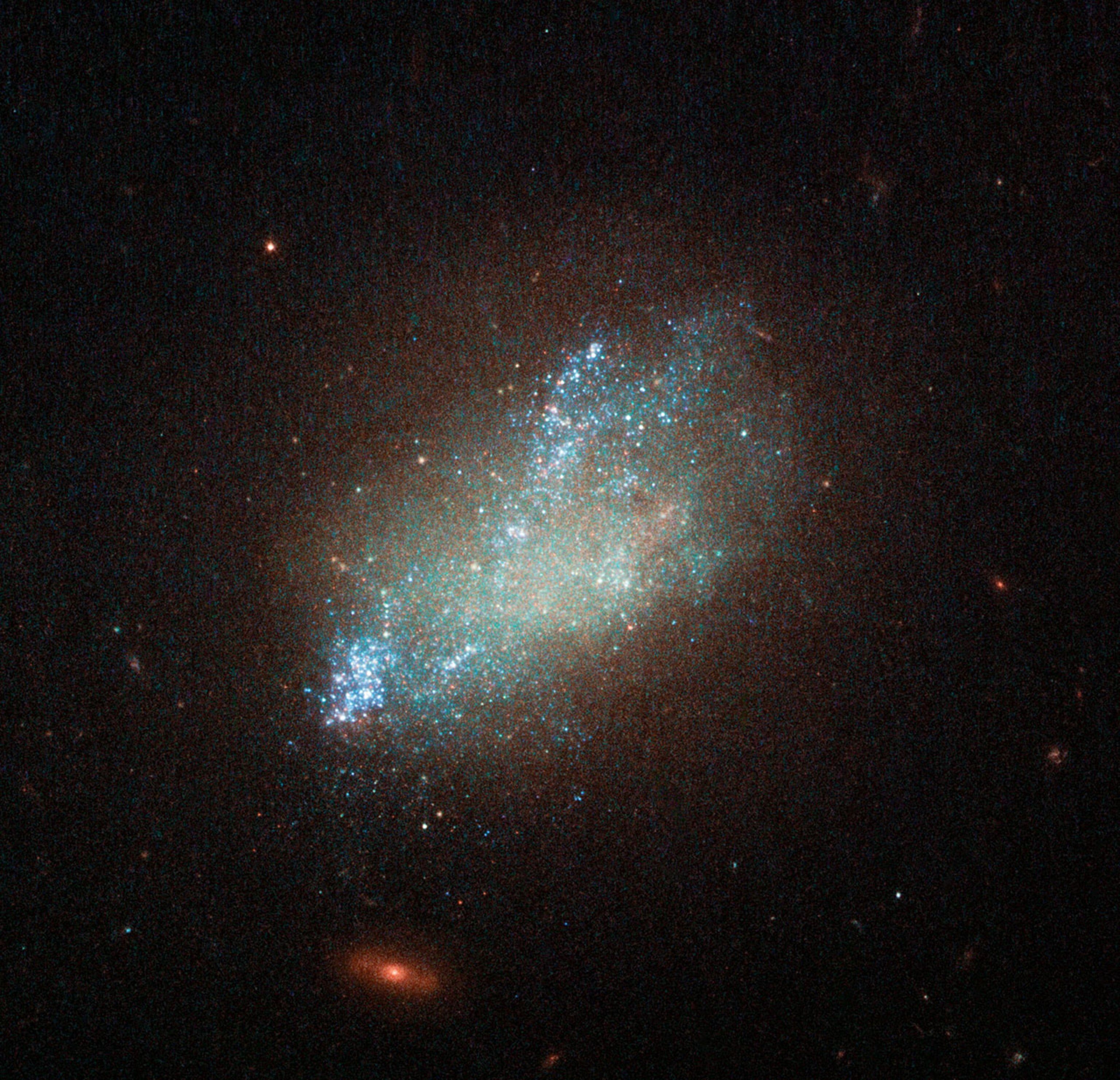 Far beyond the stars in the constellation of Leo (The Lion) is irregular galaxy IC 559.