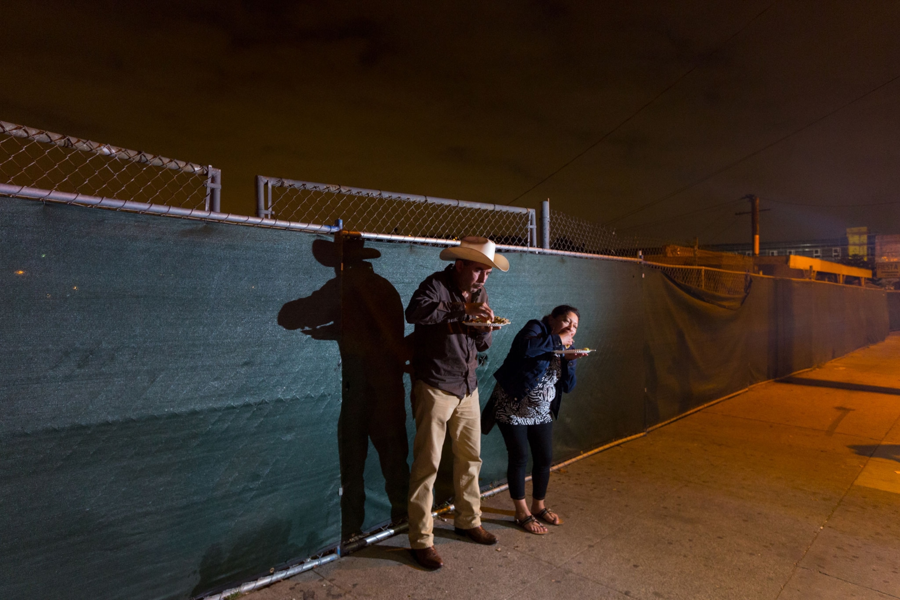 Mexican family eats taco in LA
