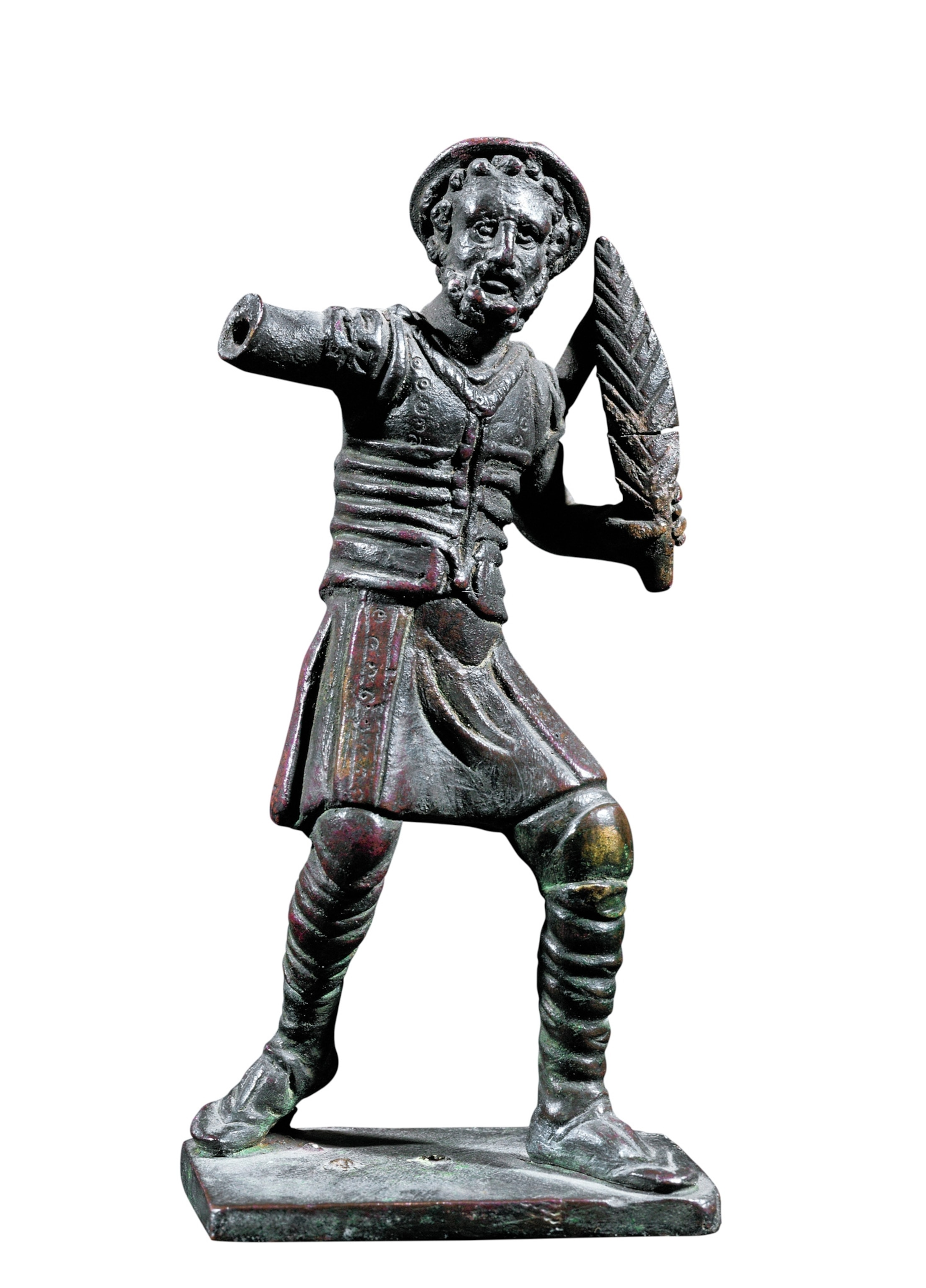 A silver statue of a man holding a leaf