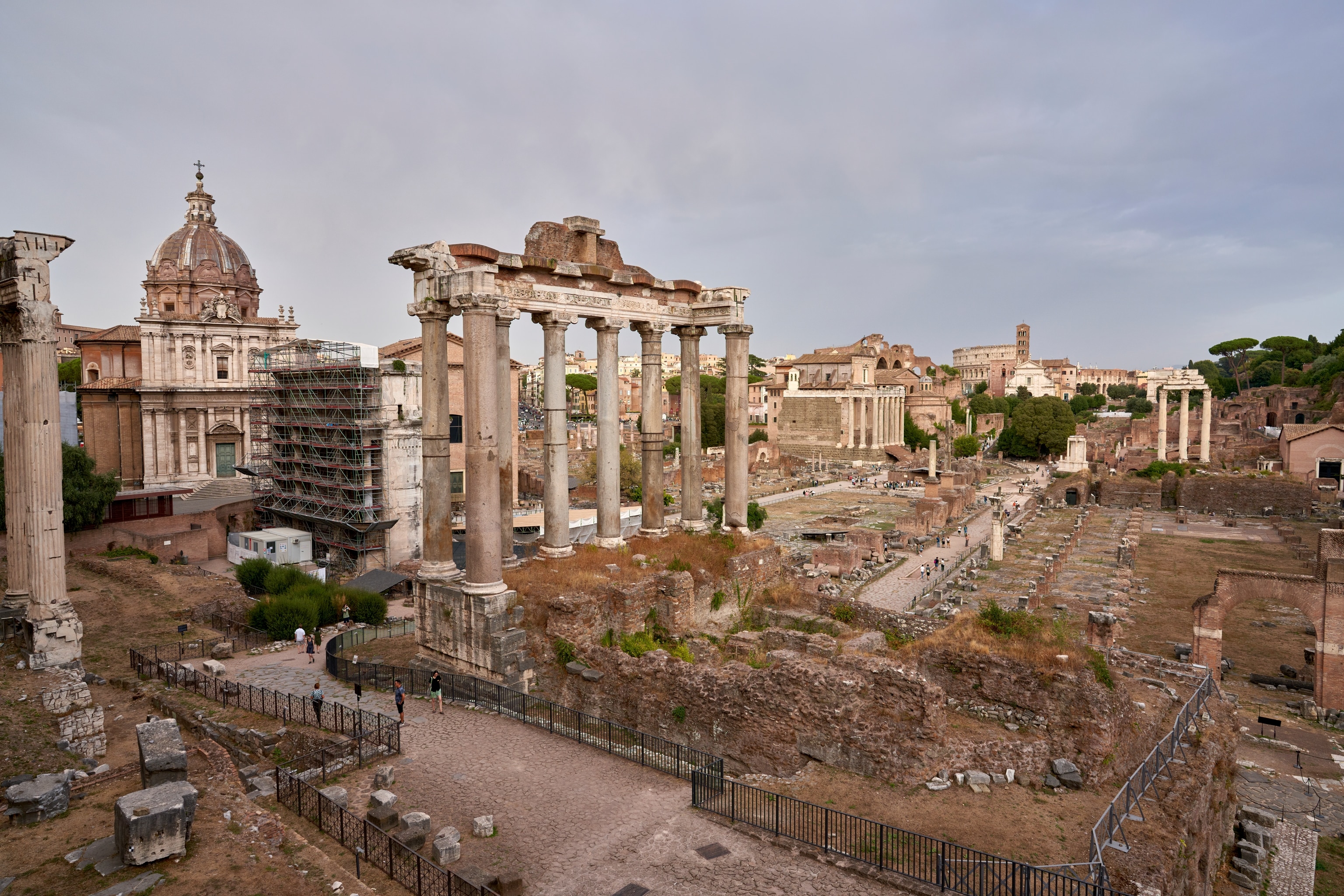 A wide view of an ancient Roman city, with decaying structures from ancient times.