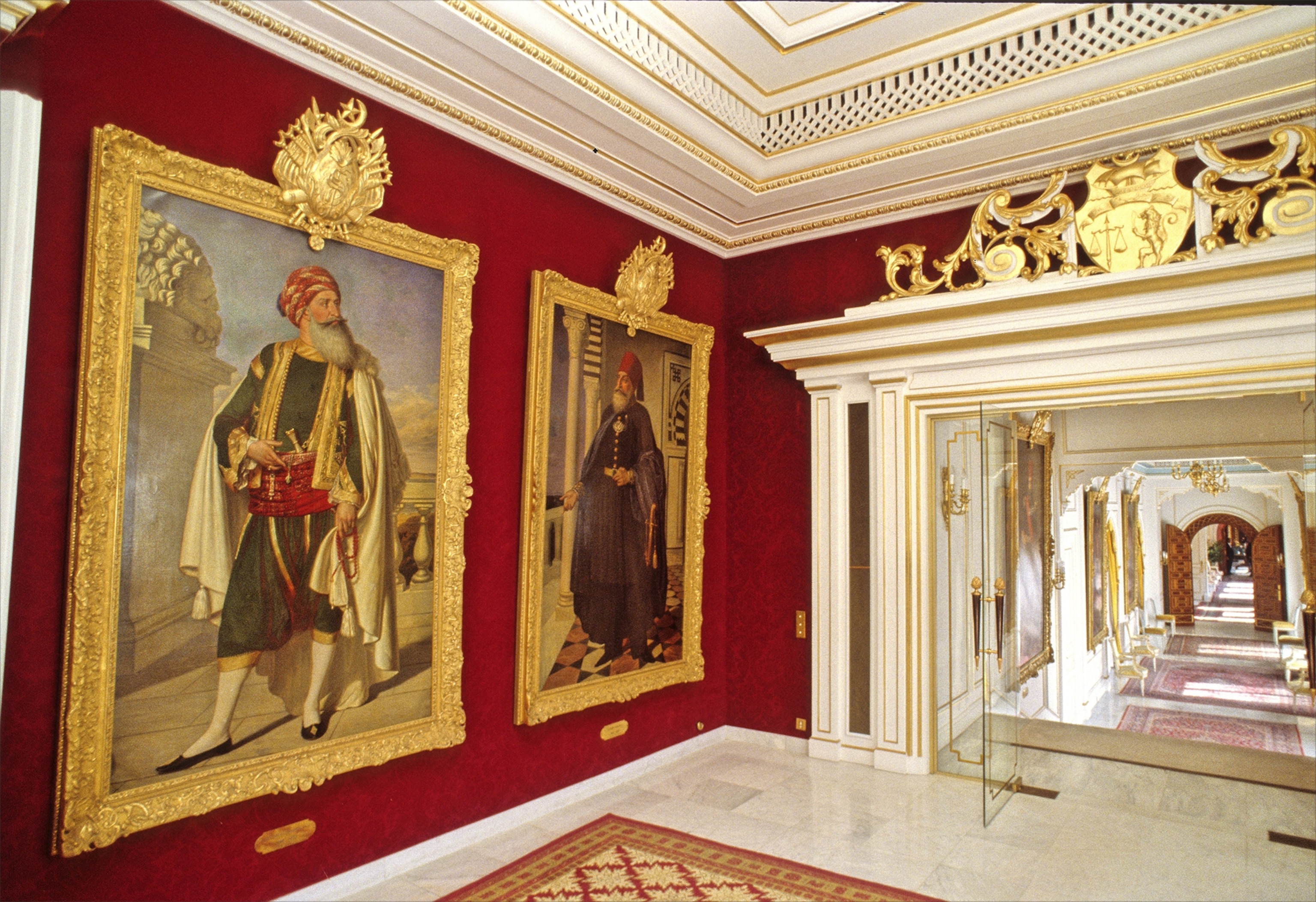 A protester wearing an EU flag stands at Ukrainian President Yanukovych's countryside residence in Mezhyhirya, Kiev's region, Ukraine, Saturday, Feb, 22, 2014. Ukrainian security and volunteers from among Independence Square protesters have joined forces to protect the presidential countryside retreat from vandalism and looting.