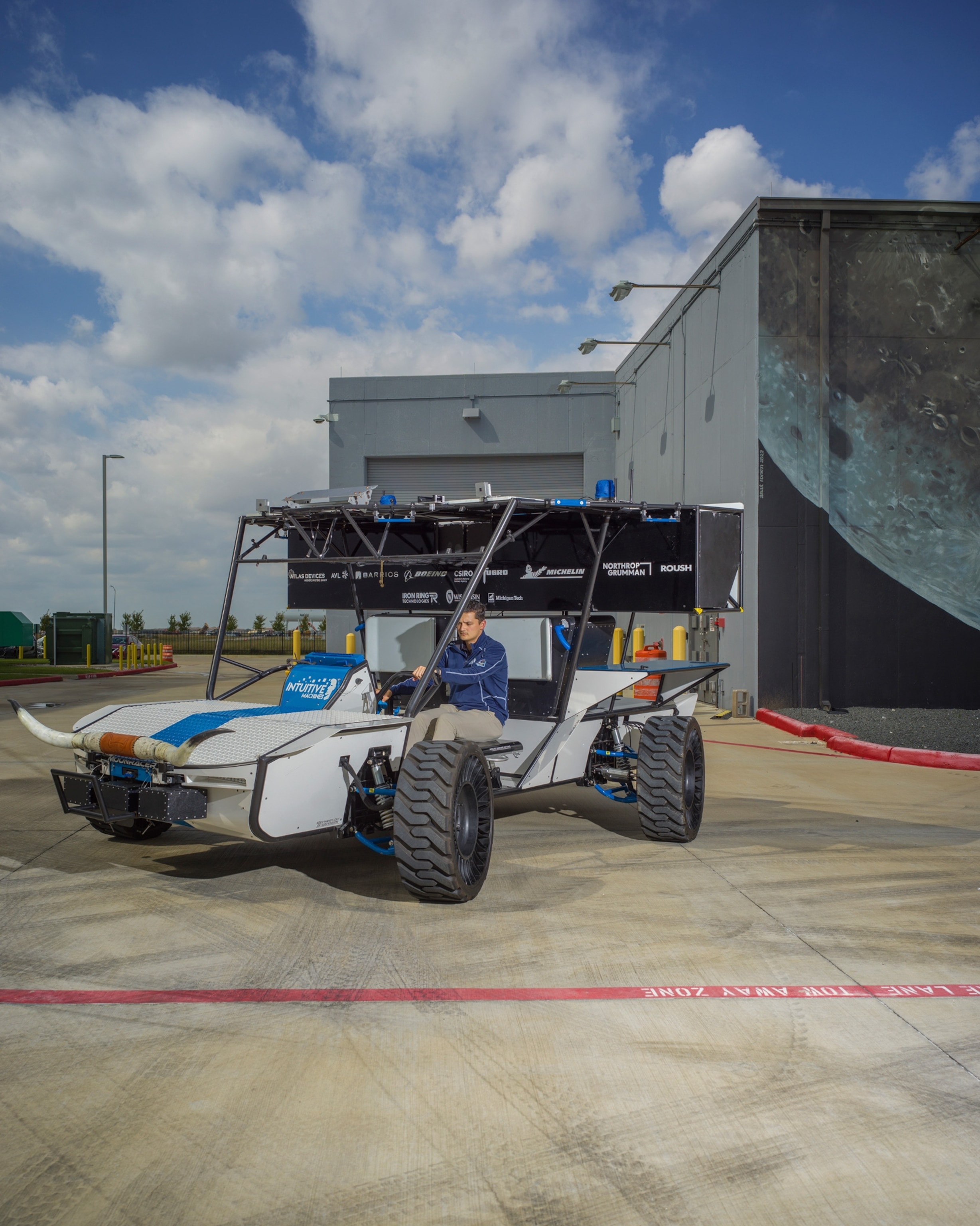 man sitting in rover