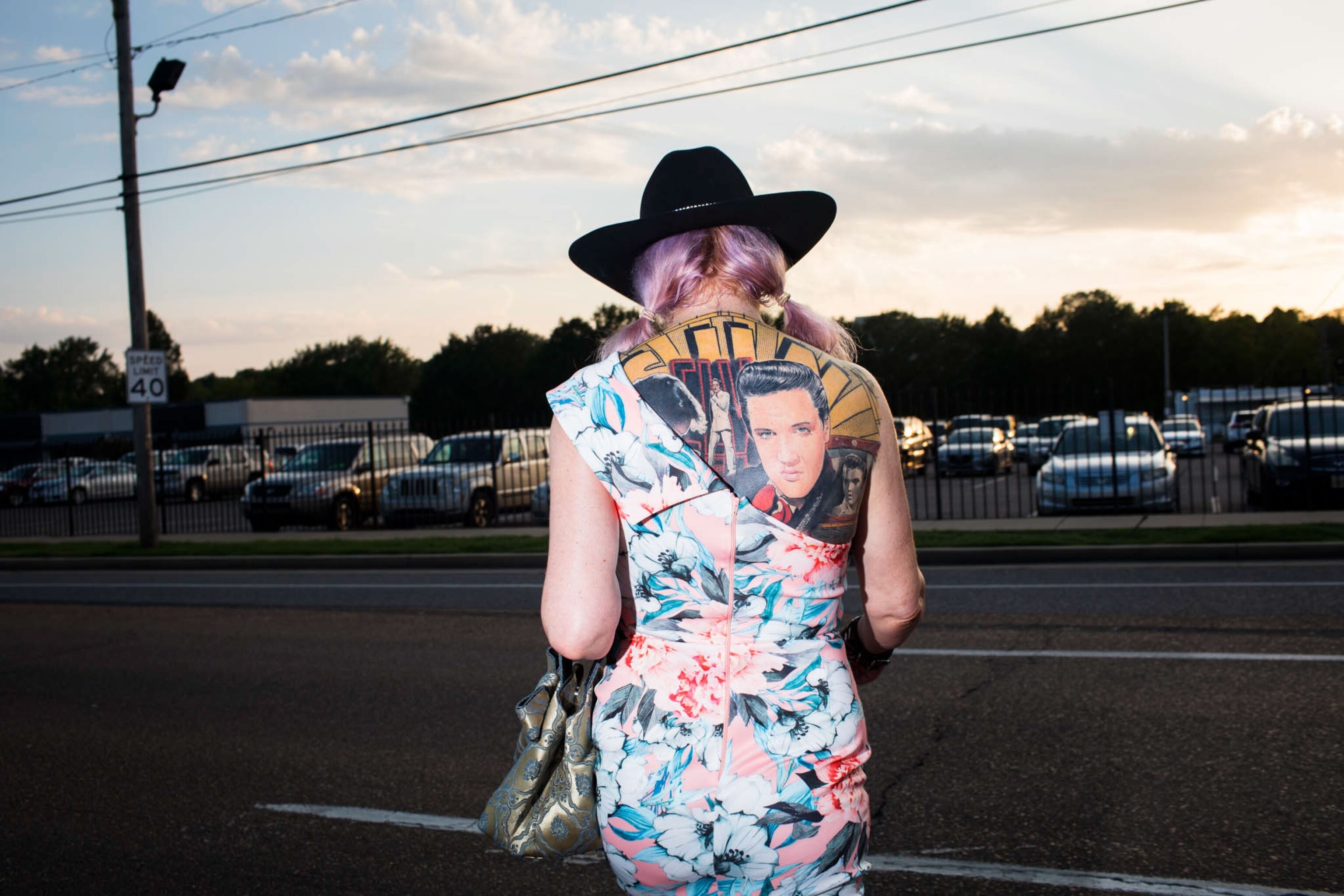 a woman with a tattoo of Elvis