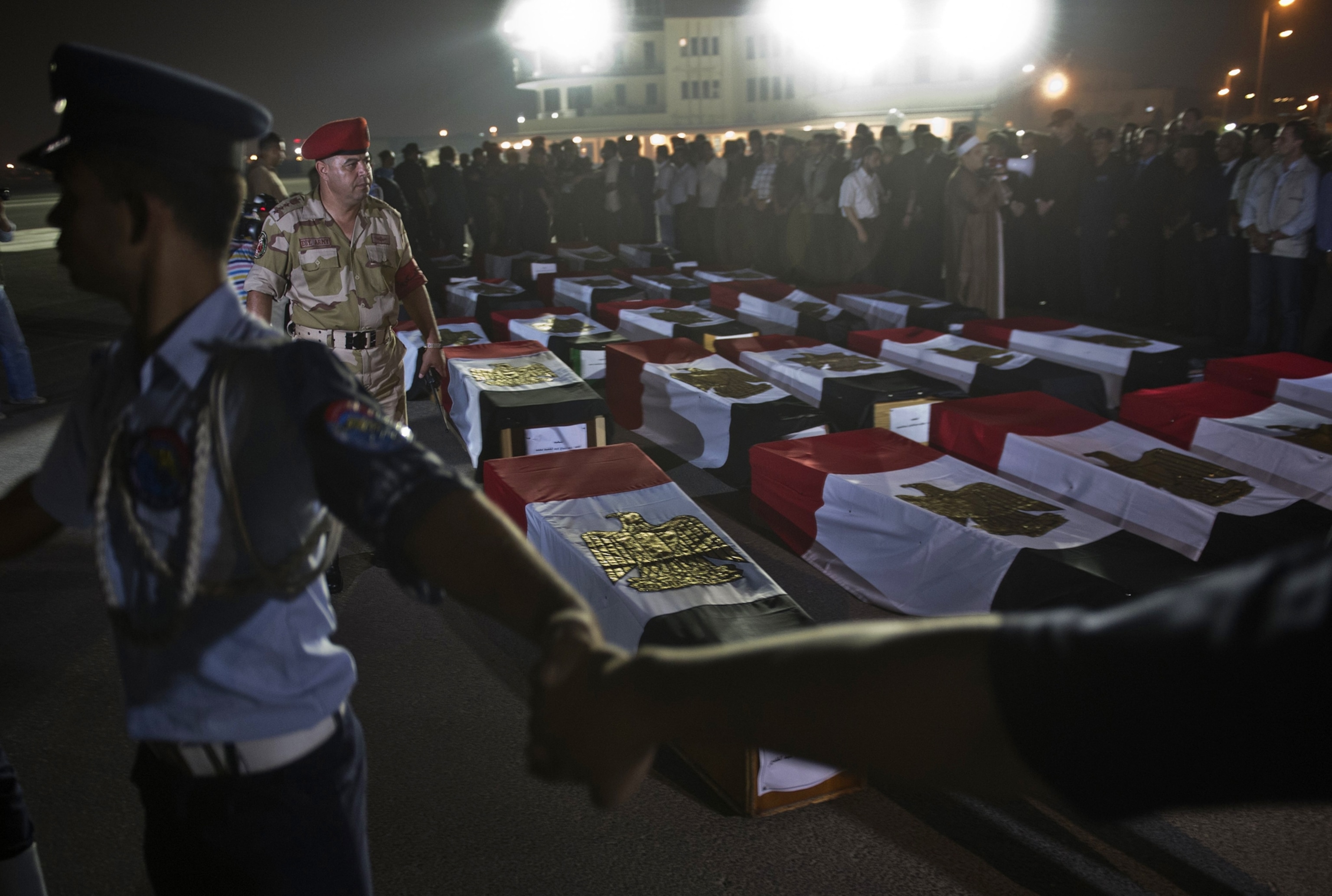 Remains of policemen killed in Sinai attack.