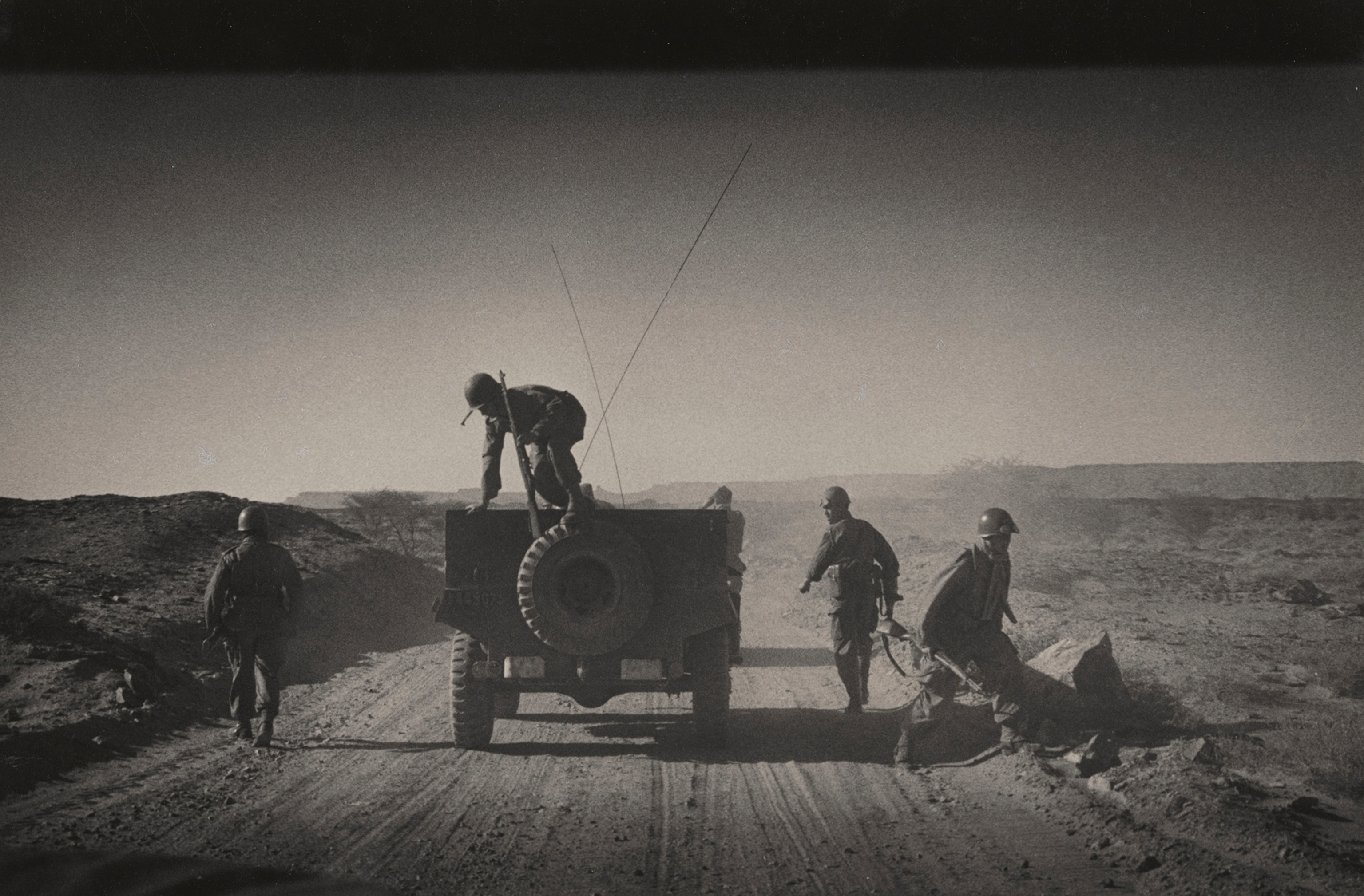 French troops scramble for cover at the threat of a rebel attack