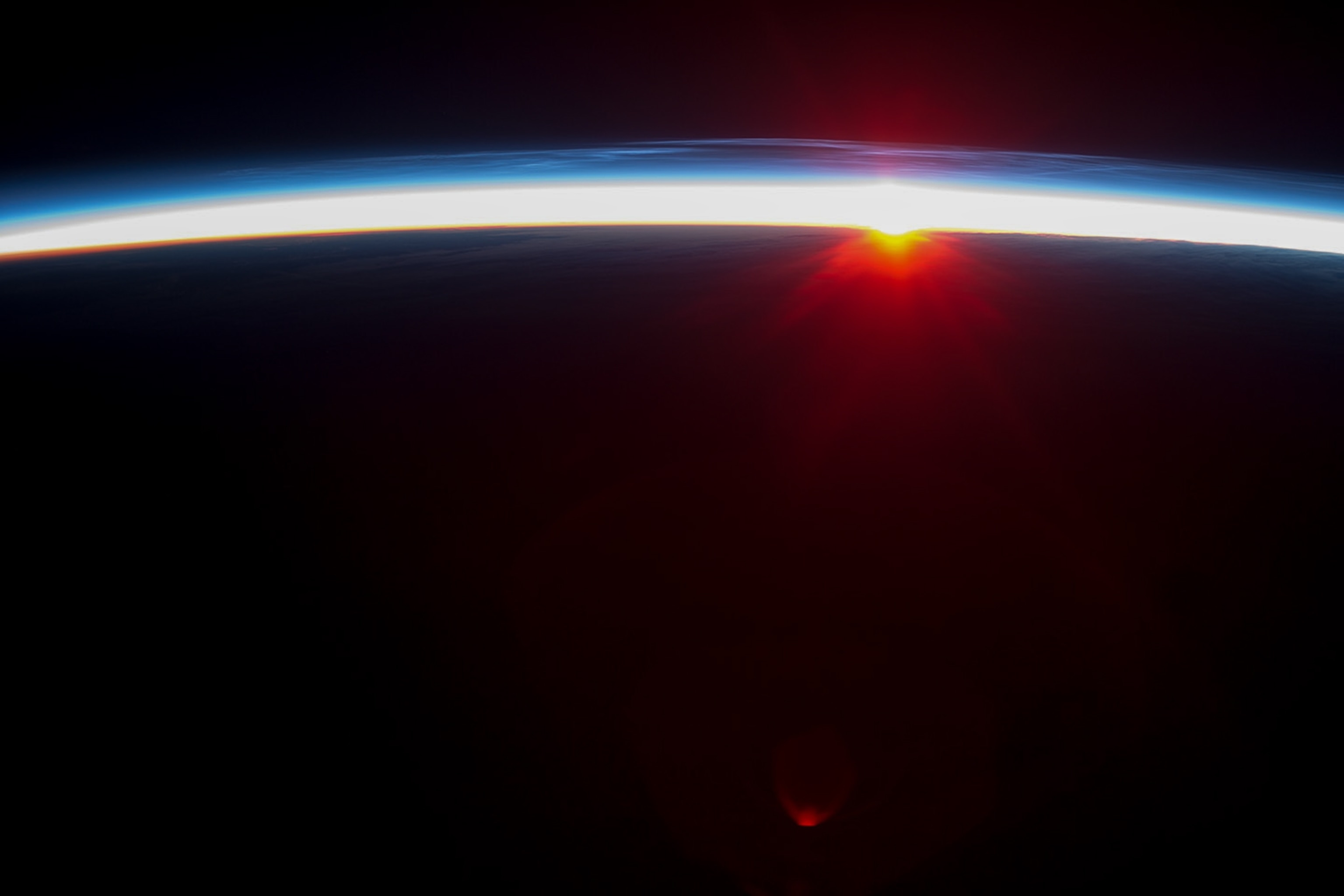 noctilucent clouds seen from the International Space Station