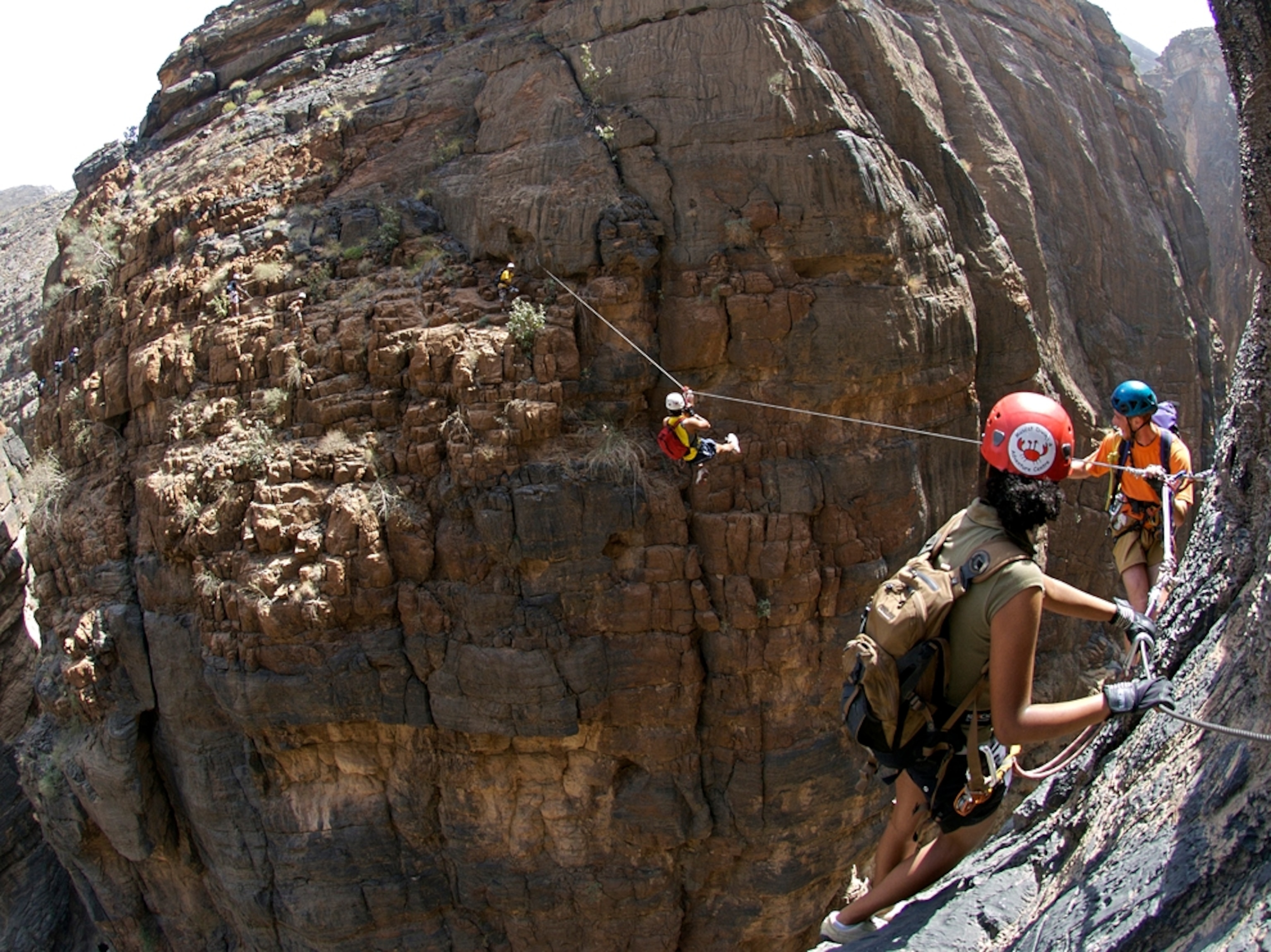 Hikers on rocks in Oman