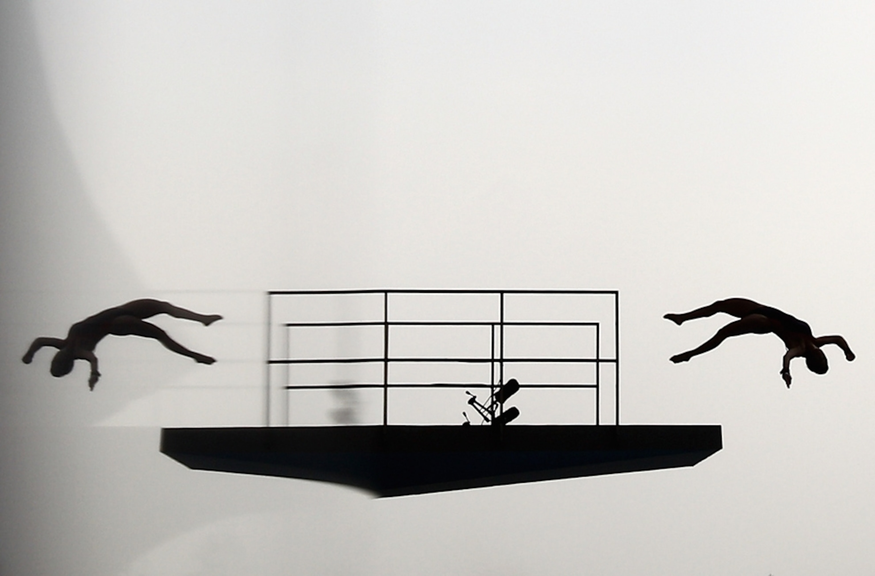 Diving picture: diver in a mirror image taken in China -- for photo gallery of best pictures of July