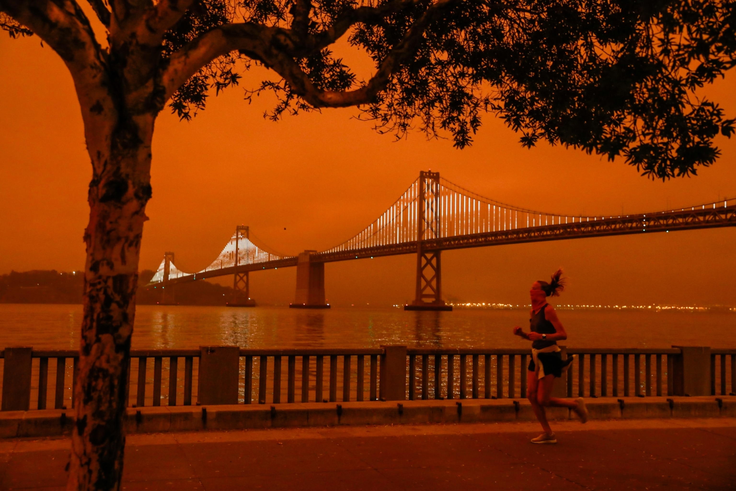 woman jog in orange smoke