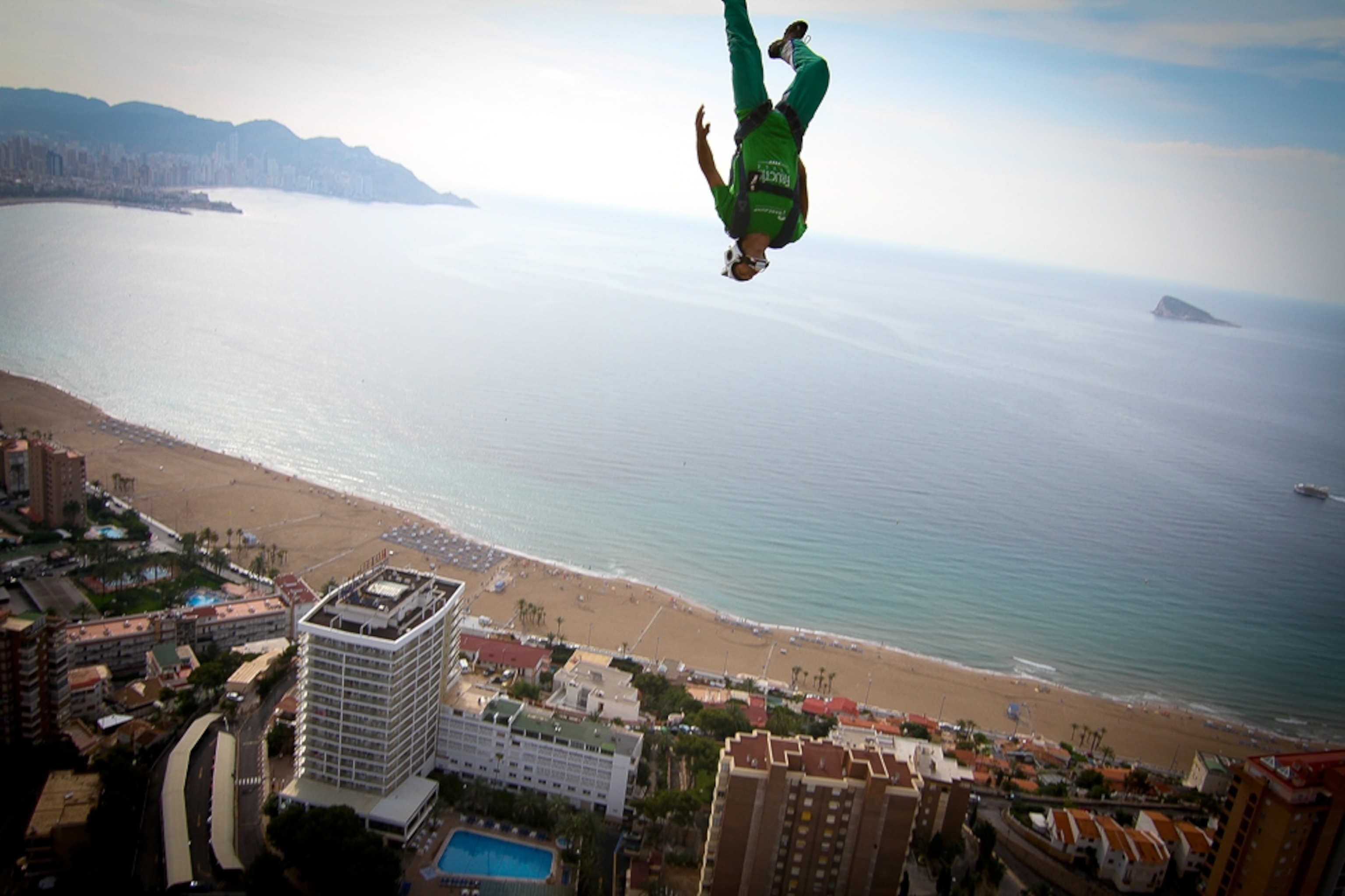 a BASE jumper falling from the roof of Europe's tallest hotel