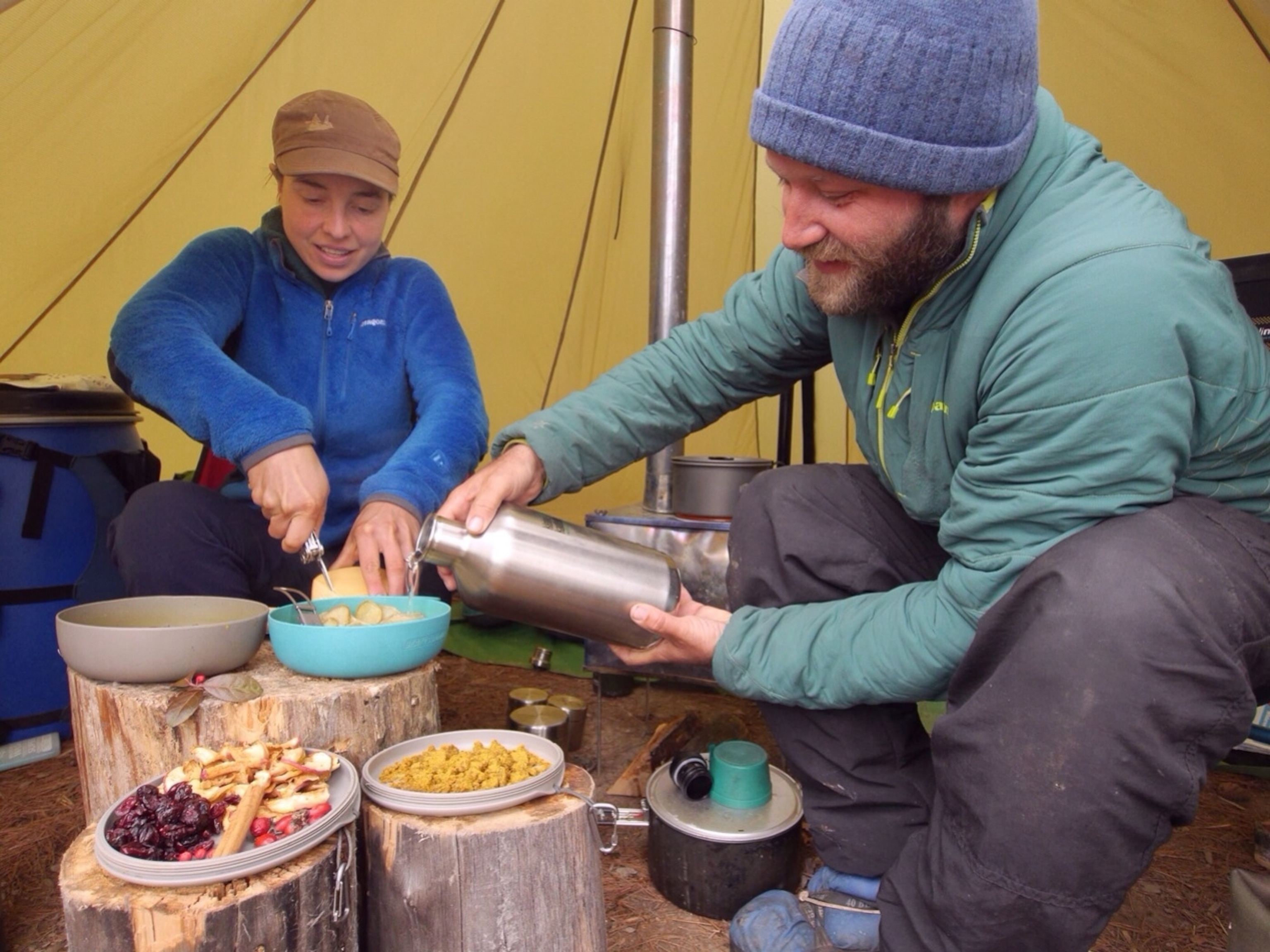 Dave and Amy Freeman prepare a giant meal for Thanksgiving inside their tipi tent. Photo: Dave Freeman