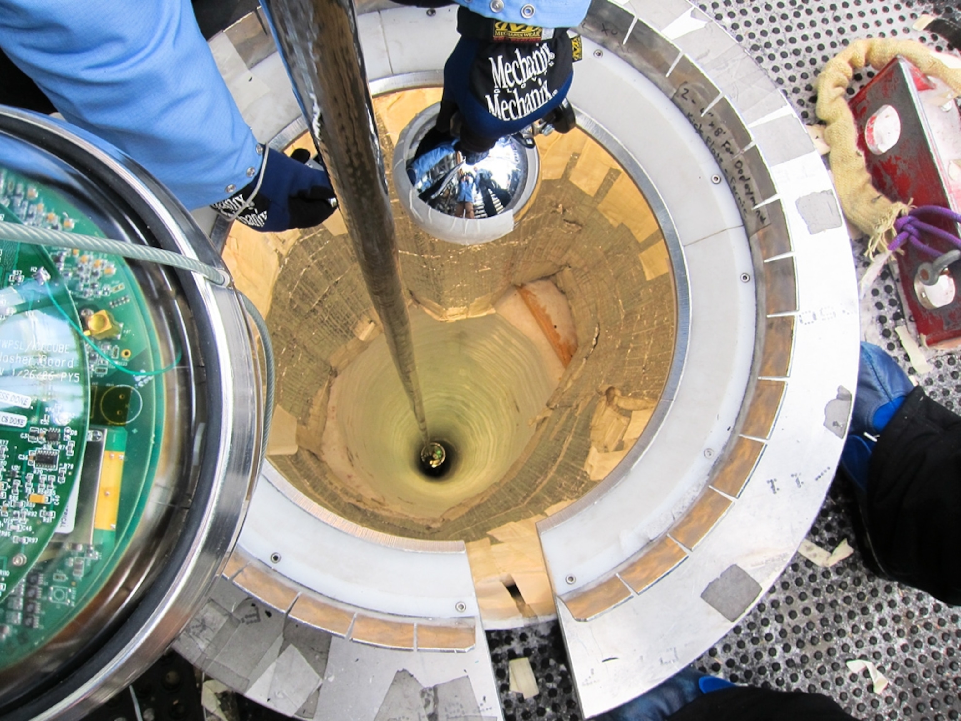 Scientists testing IceCube instruments