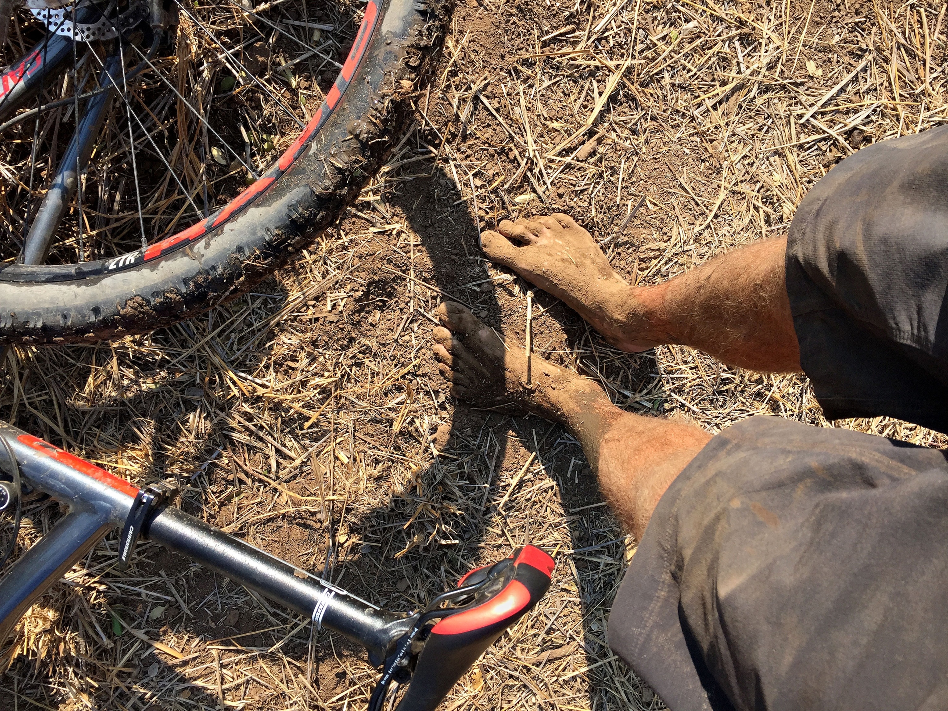 muddy feet of Jon Bowen during Tour de Tuli in southern Africa
