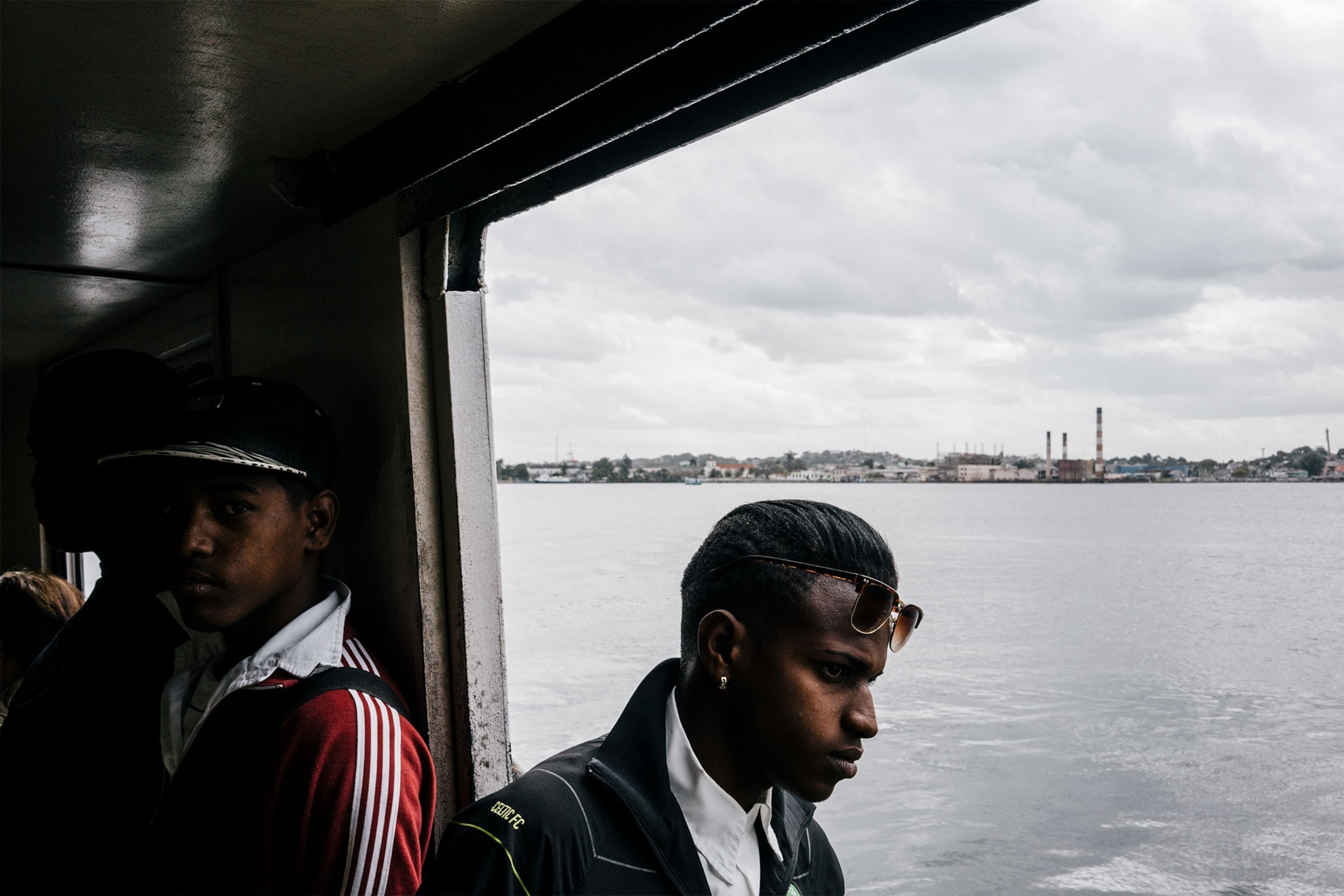 Cubans on a commuter ferry