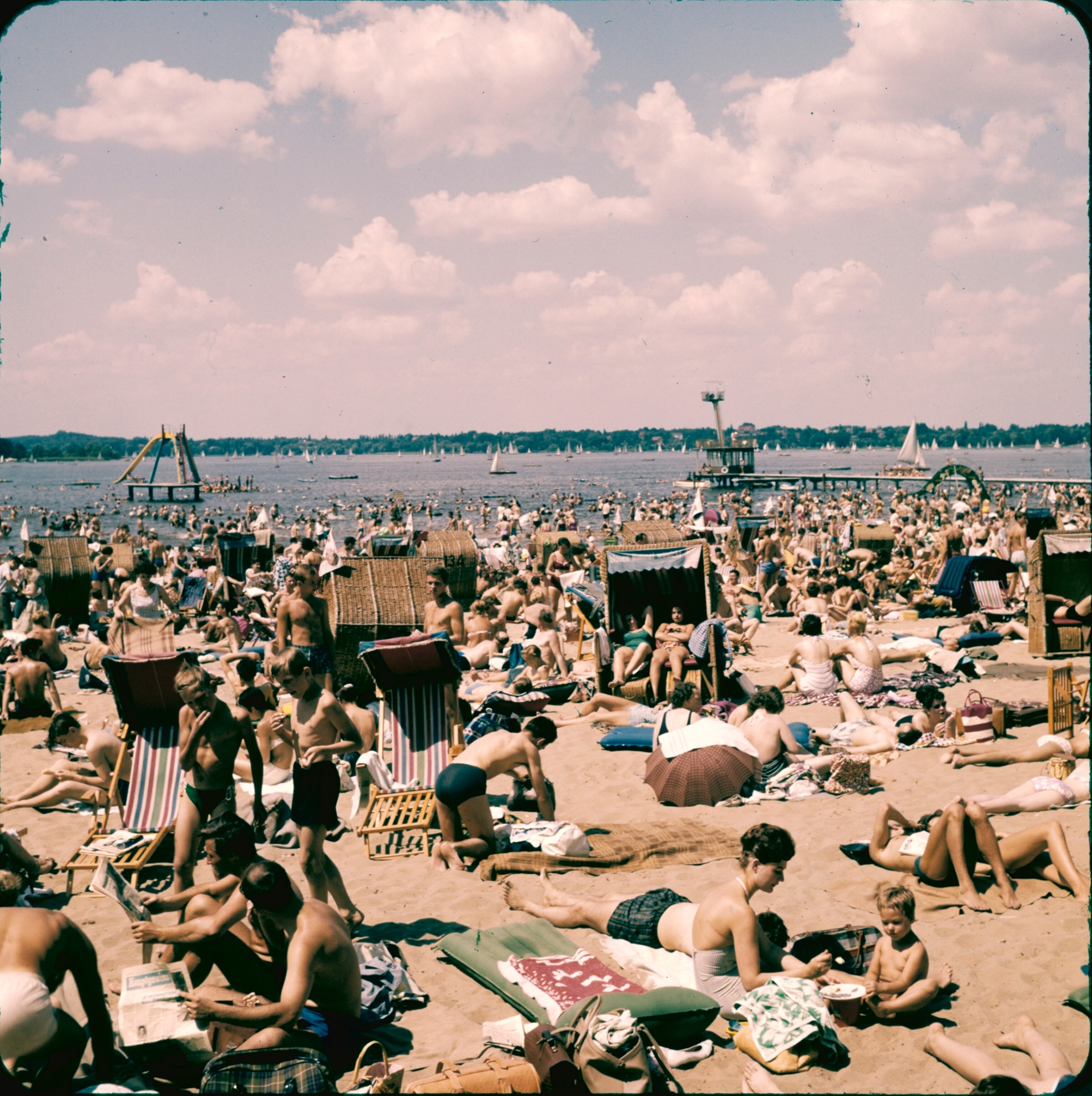 Wannsee Beach draws as may as 40,000 bathers on a warm Sunday. Here, in the southwestern suburbs, the Havel River broadens into a chain of lakes that teem with boats. Steamers carry excursionists as far as the East German border. Other resort lakes that ring the city lie out of bounds to West Berliners.