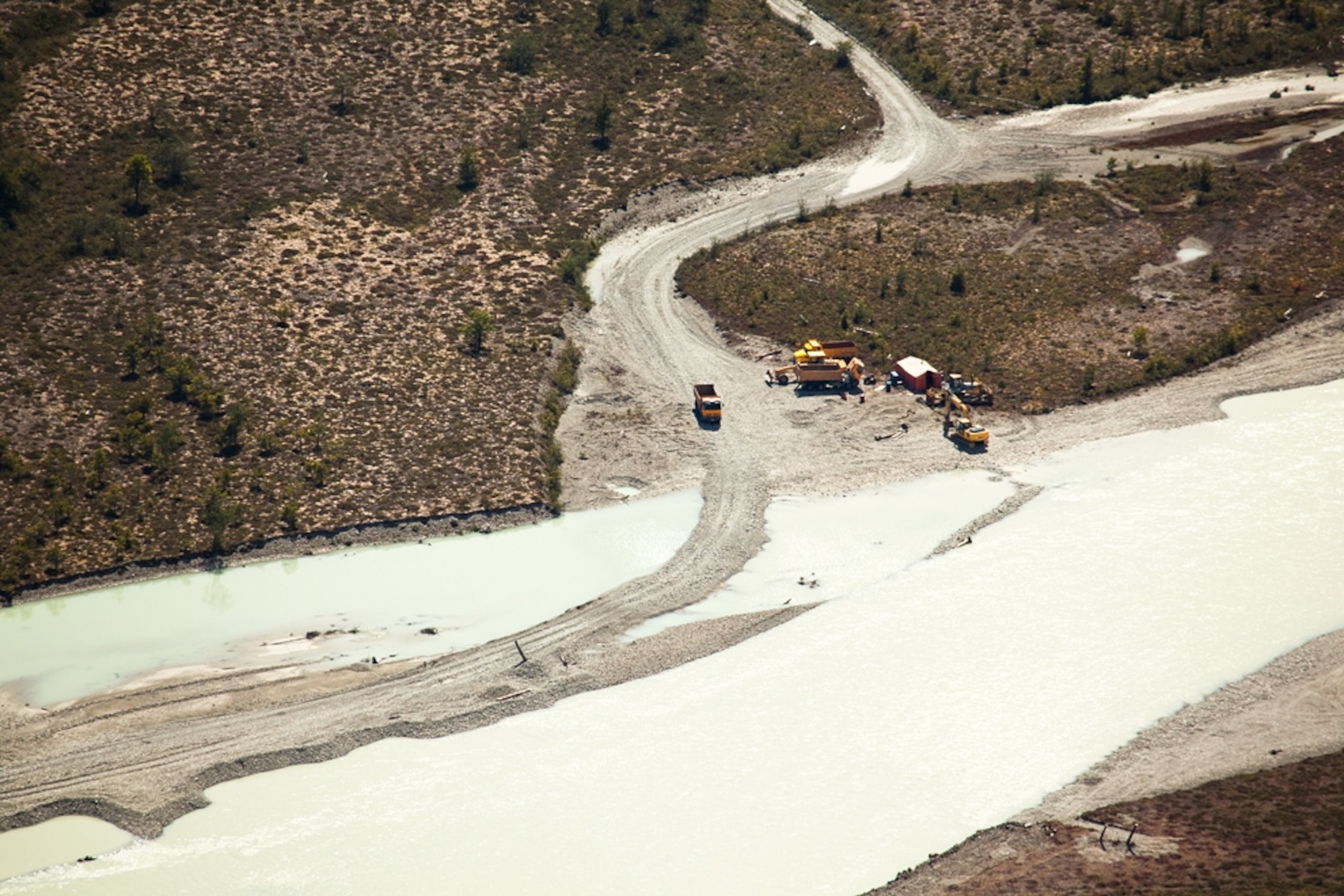 An aerial view of road building along the stony Pascua River