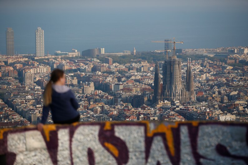 a person overlooking the sagrada familia in Spain