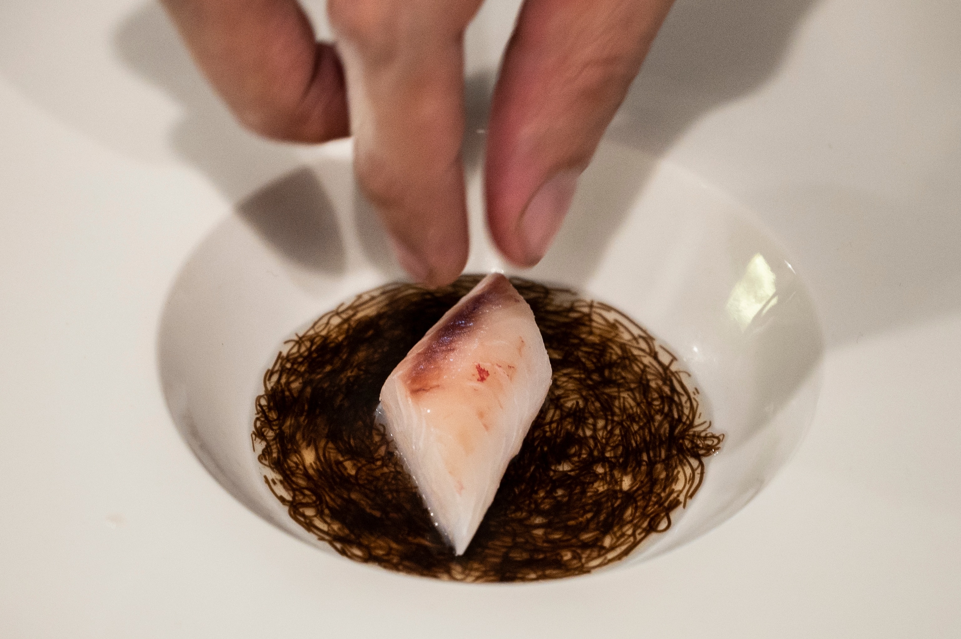 Image of local fish locally caught by Urak Lawoi being served at Samlor.bkk restaurant in Thailand.