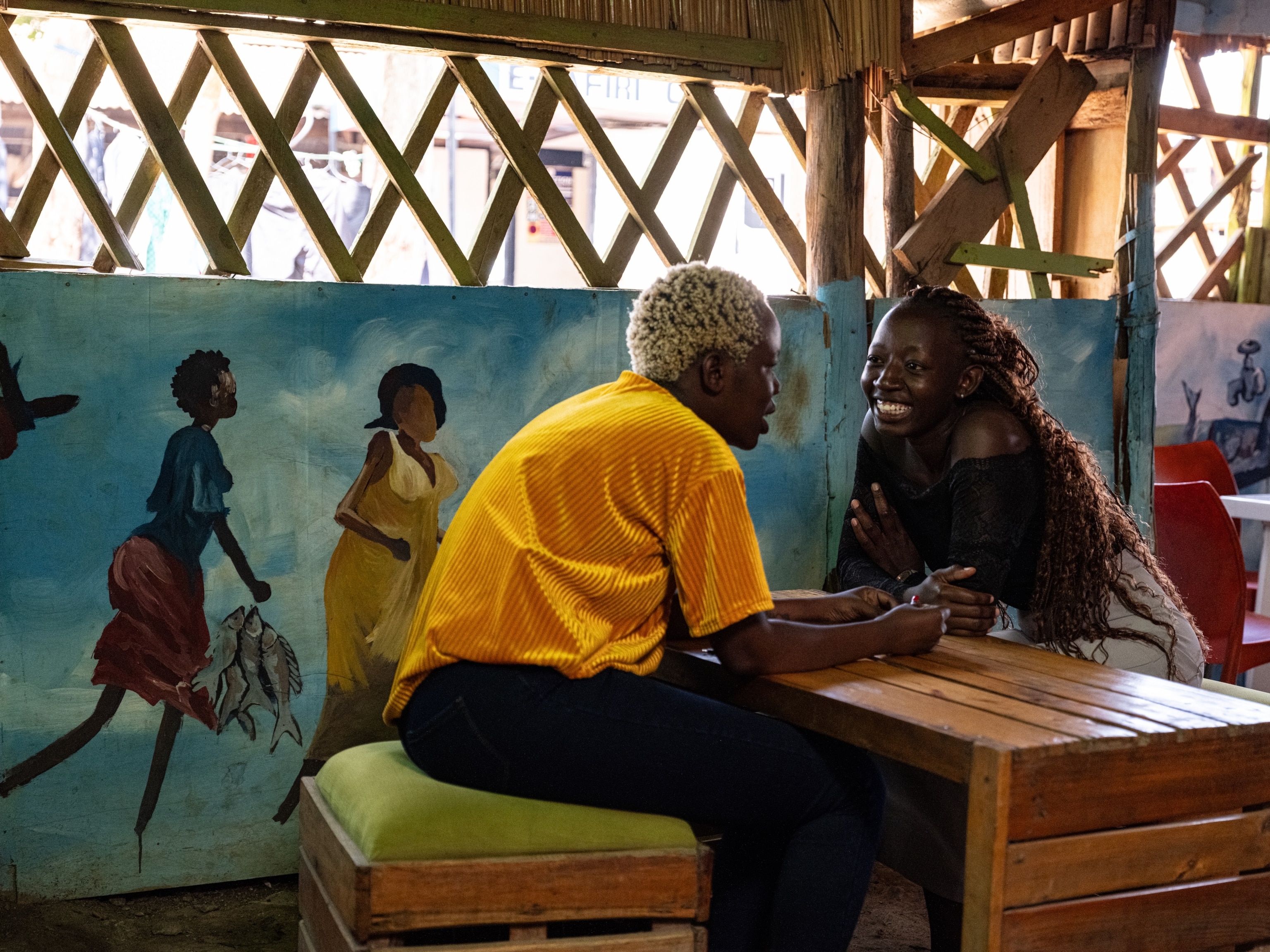 Two women speaking in Kenya
