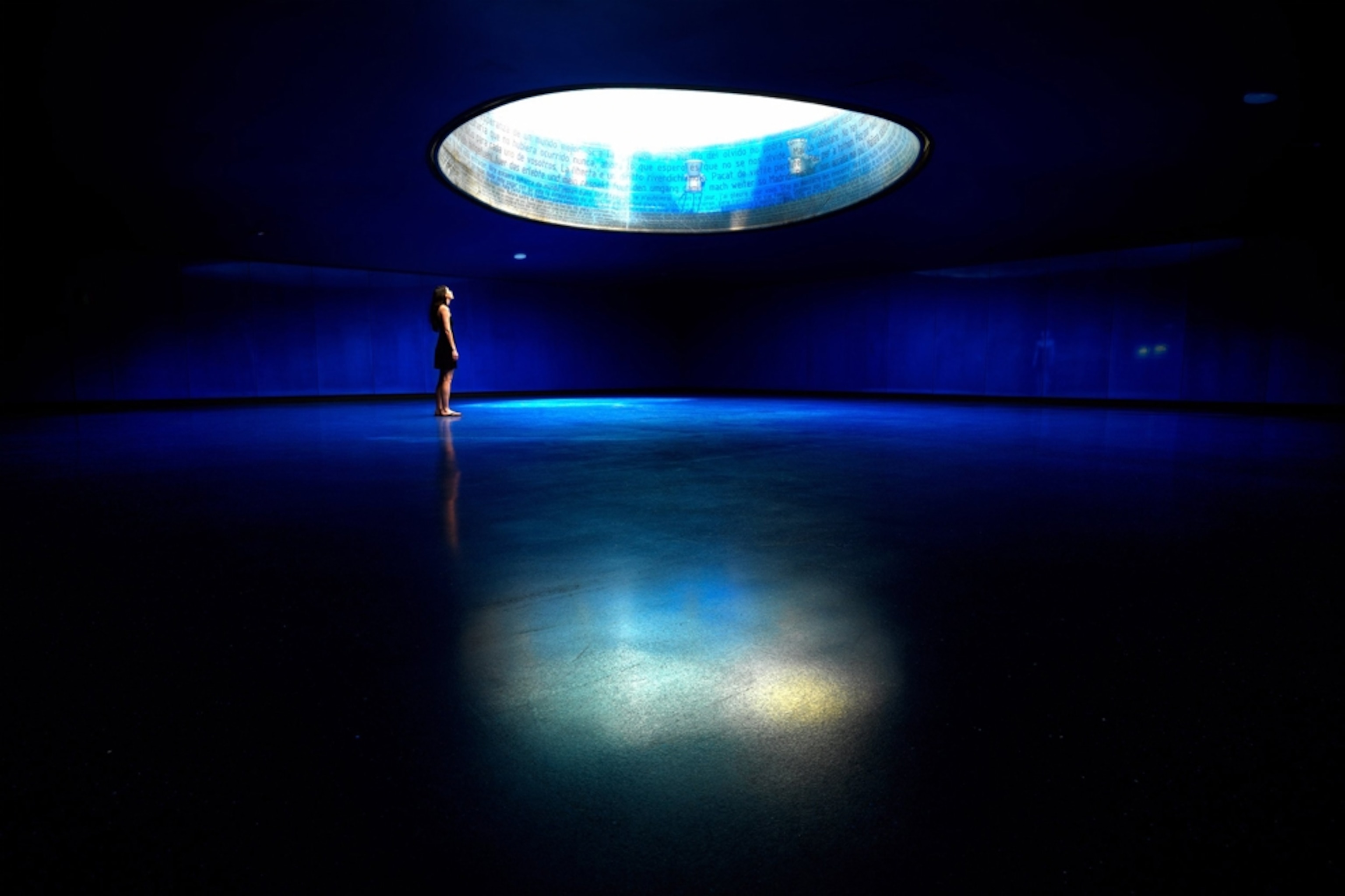 Woman inside the Atocha Station Memorial
