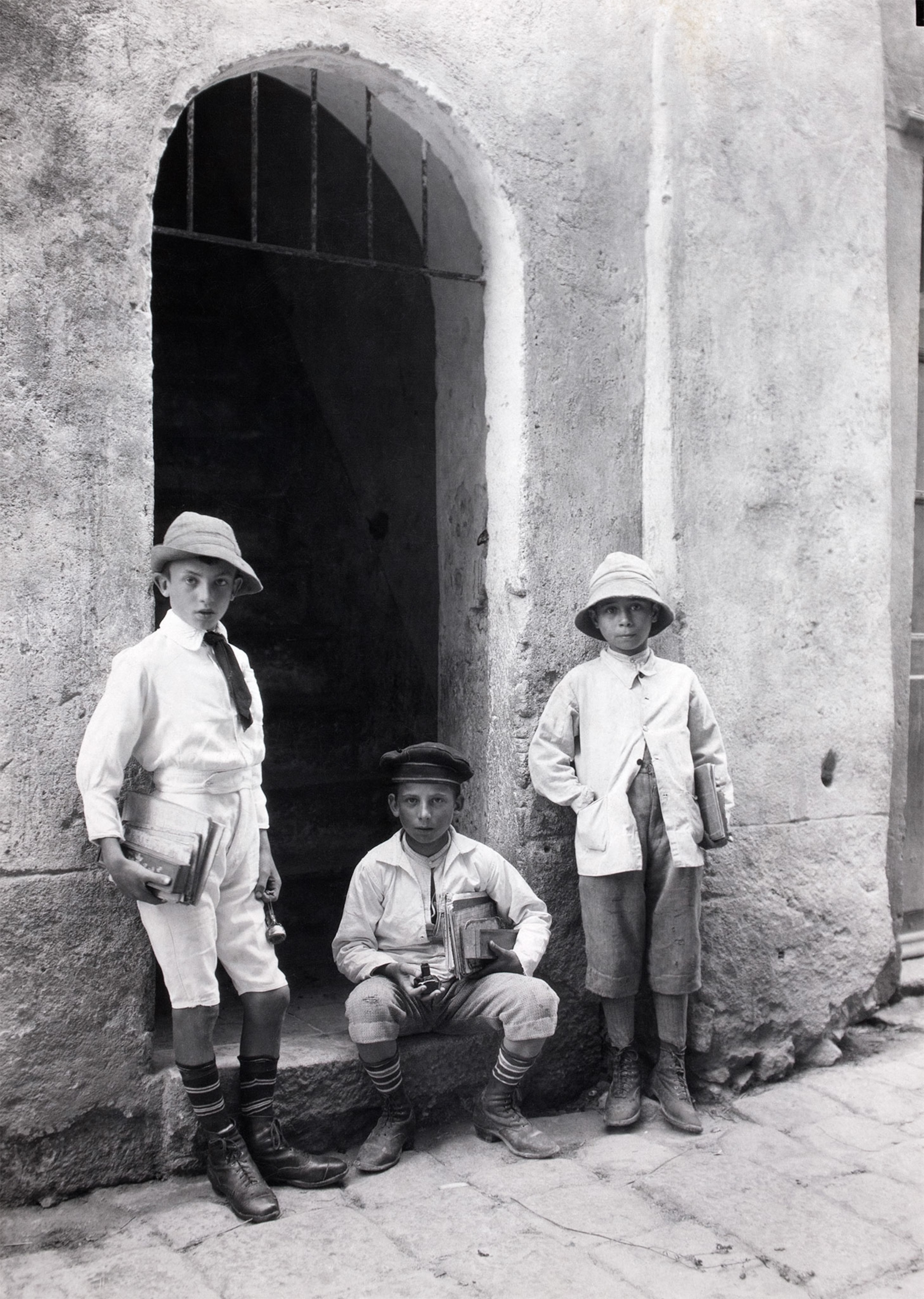 schoolboys on their way to school in Corsica, France in 1923