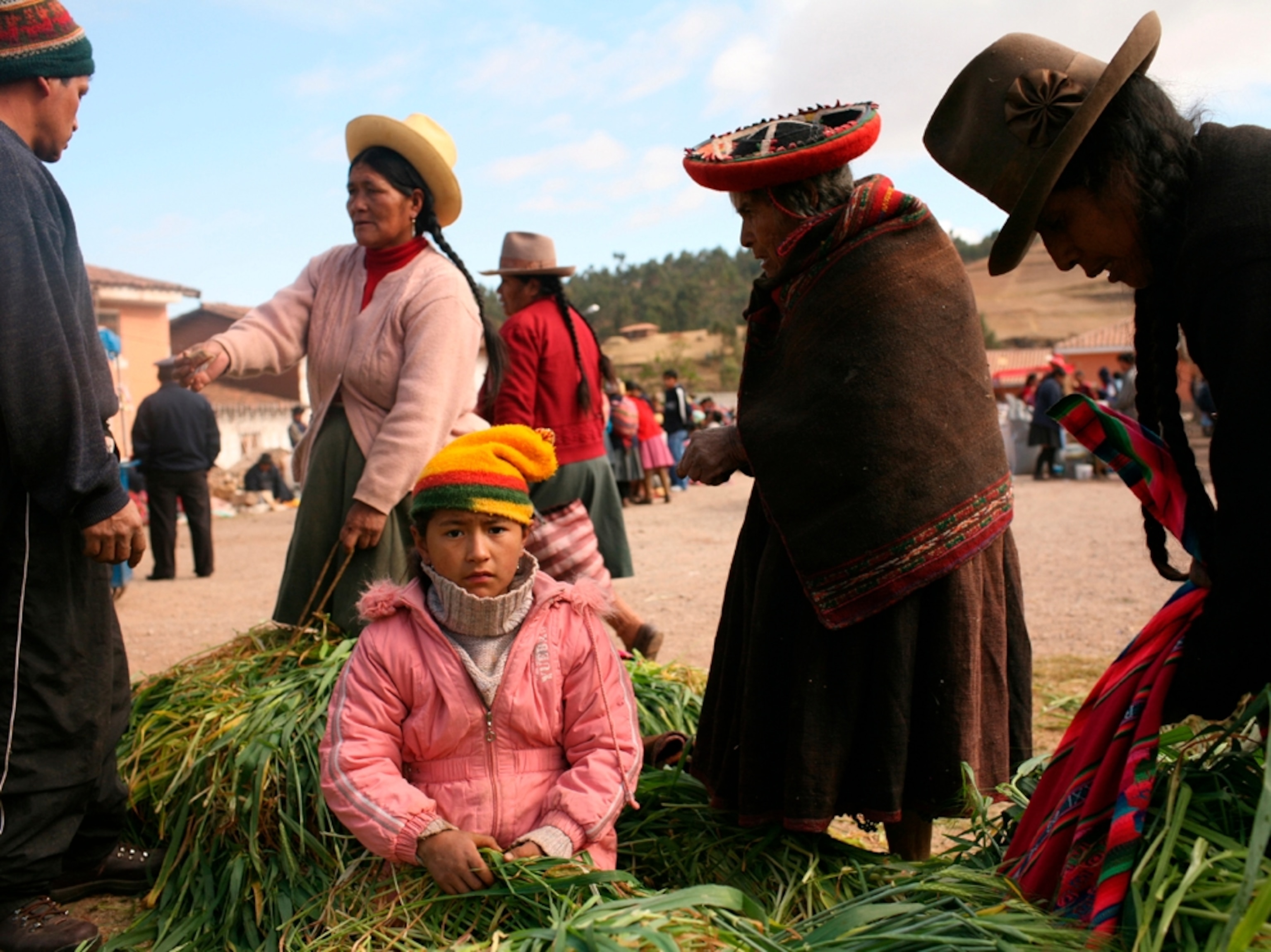 women and girl at market at Chinchero