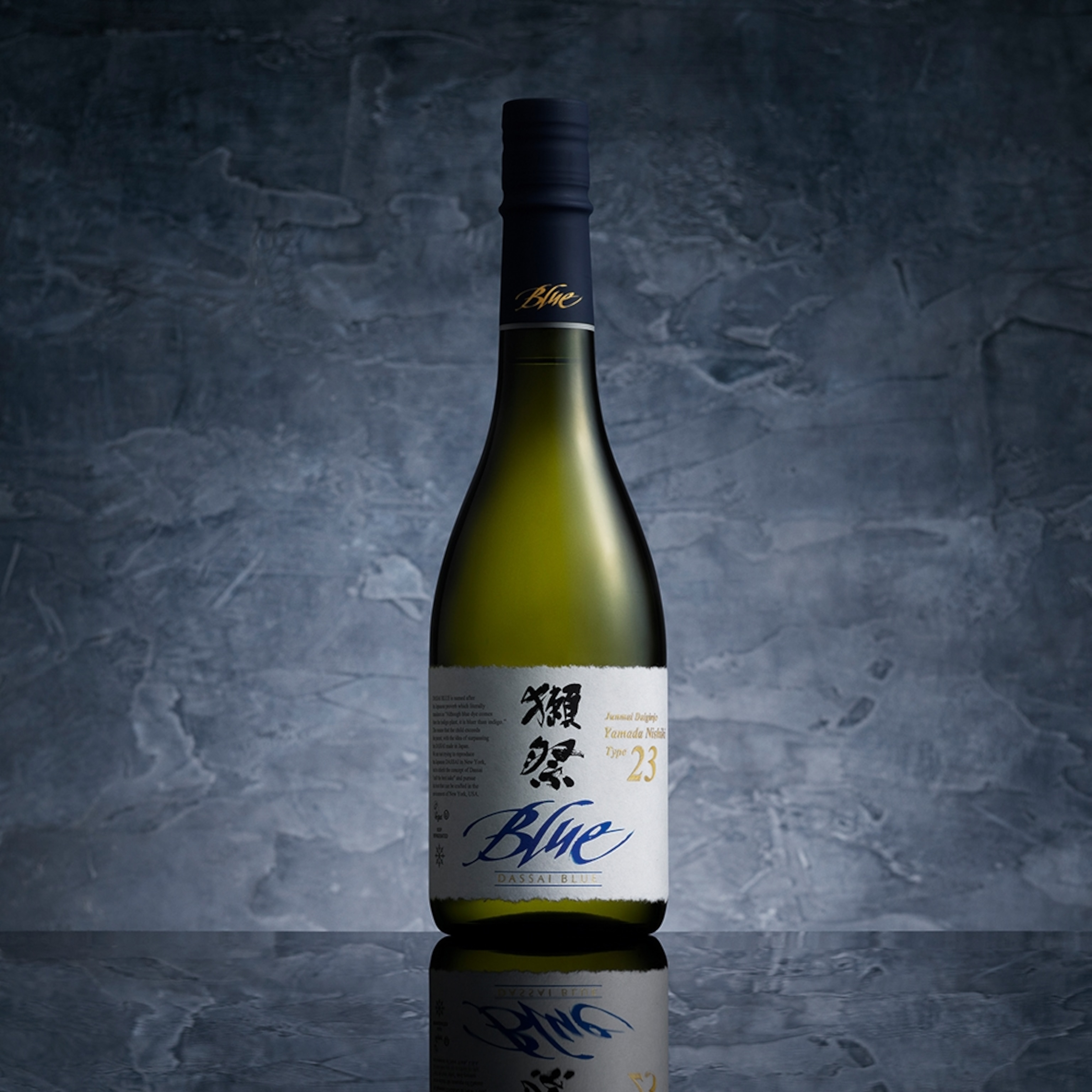 A bottle of sake in spotlight.
