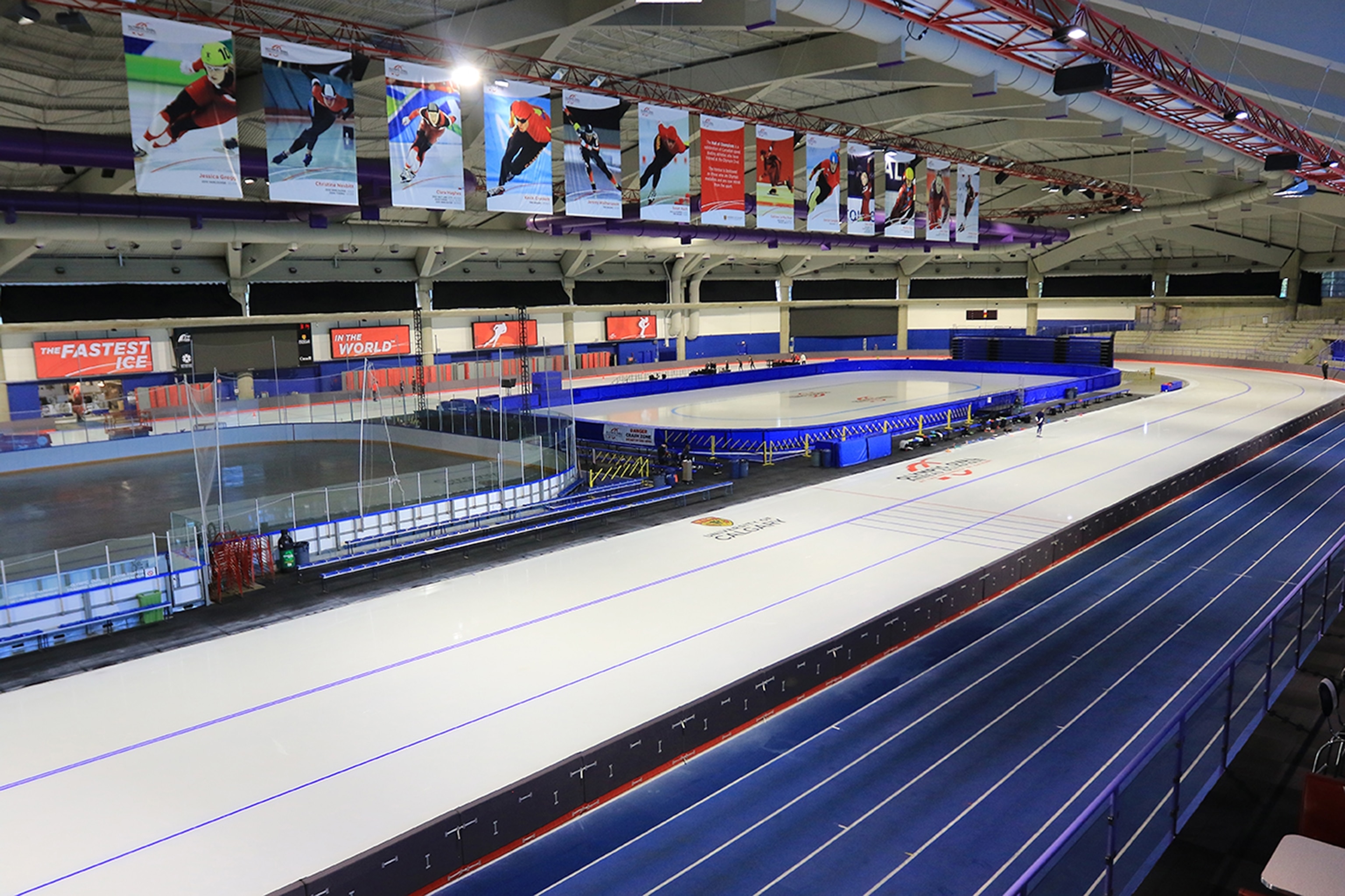 View of an empty ice rink from the bleachers
