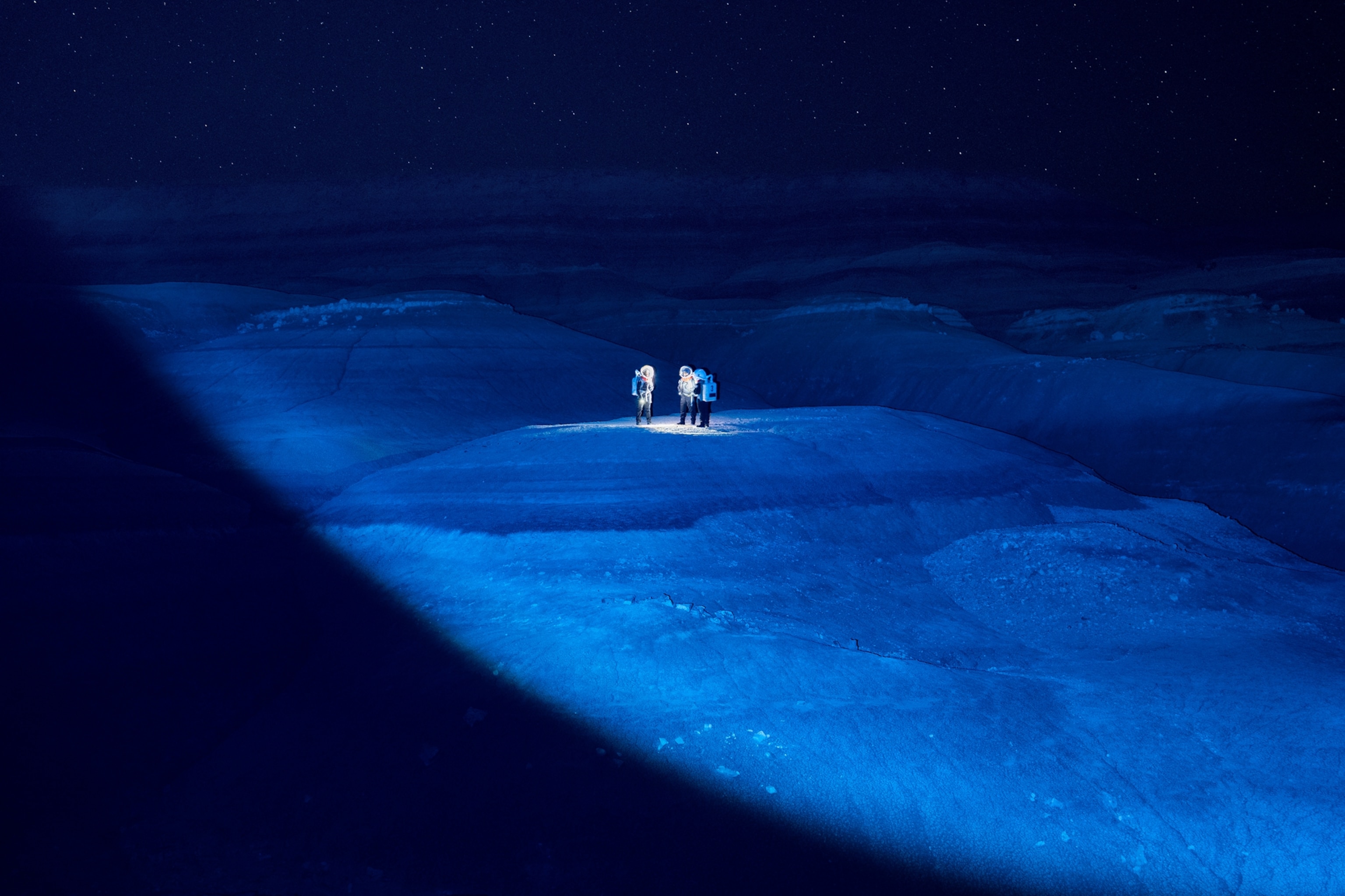 Day 2 of Ares 1 crew training at Mars Desert Research Station outside of Hanksville, Utah on October 12, 2025. The crew consists of analog astronauts Commander Rym Chaïd, Crew Scientist & Health and Safety Officer Shriya Musuku, Crew Engineer Ricardo J. Gonzalez, and Crew Journalist & Green Hab Officer Mackenzie Calle. Here, Rym, Shriya, and Ricardo participate in a night training EVA.