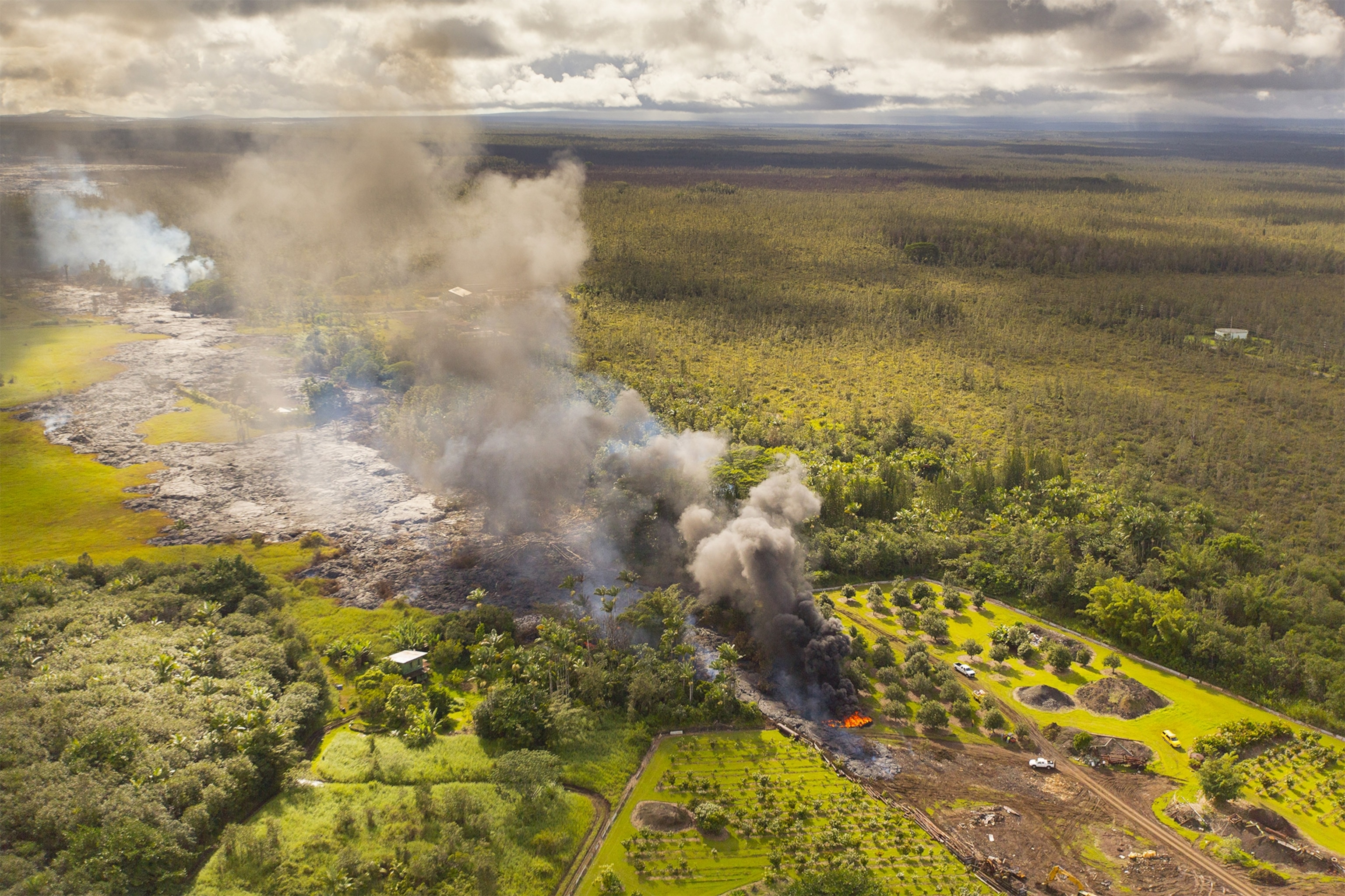 An aerial photo of lava flow from the Kilauea Volcano