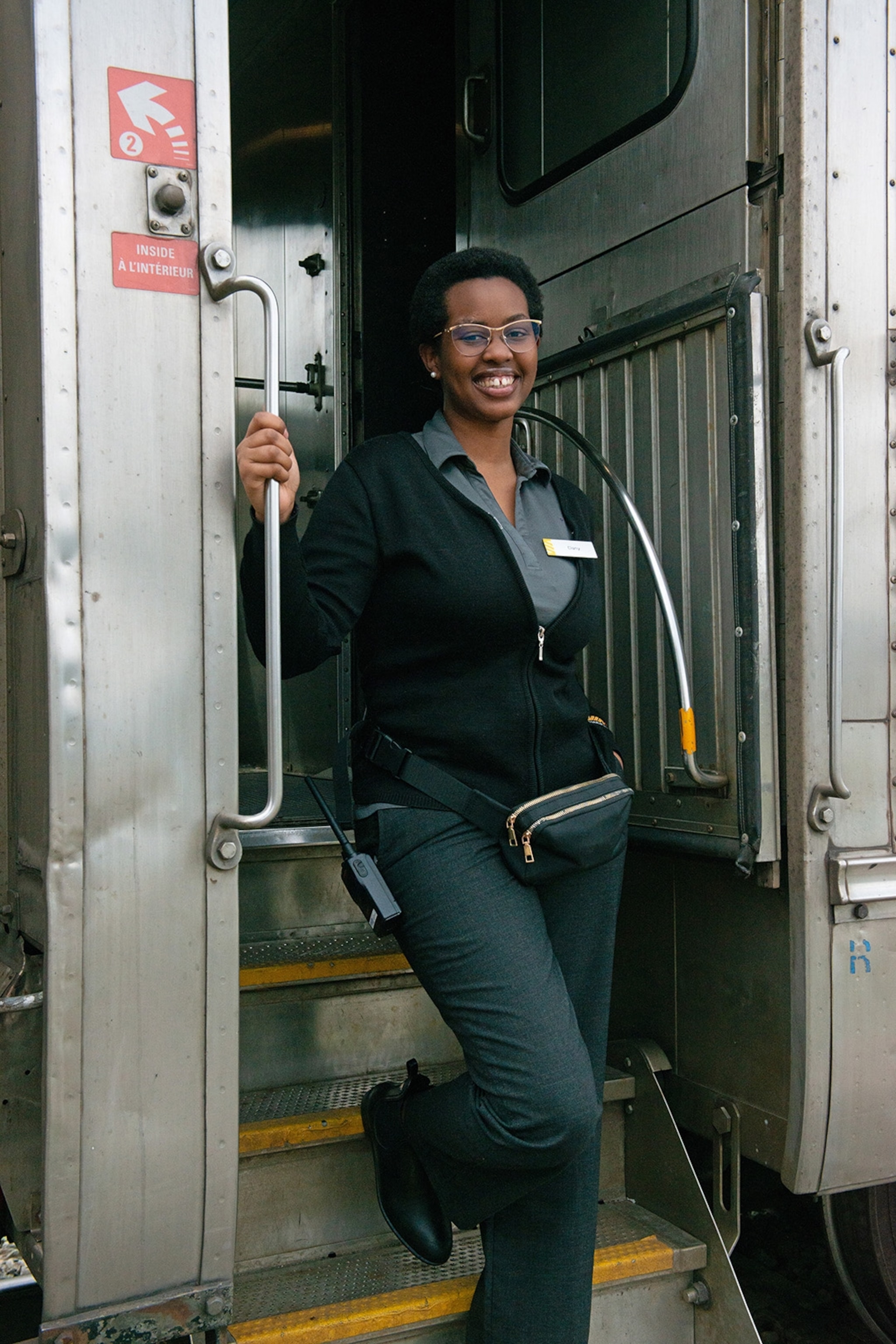 Skeena train attendant, Dany Clarissa, takes a break at one of the stations.