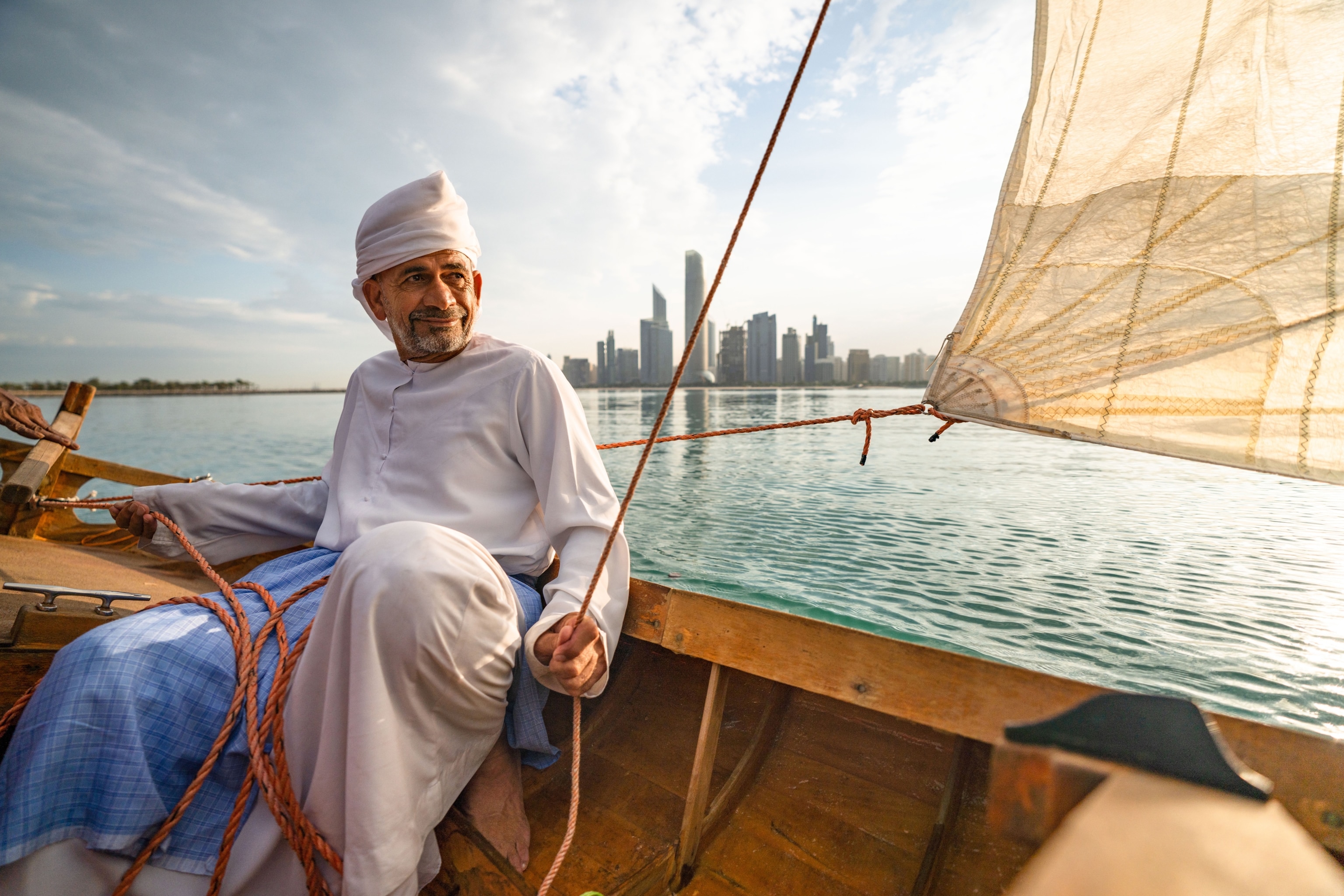 a traditional dhow in Abu Dhabi Corniche