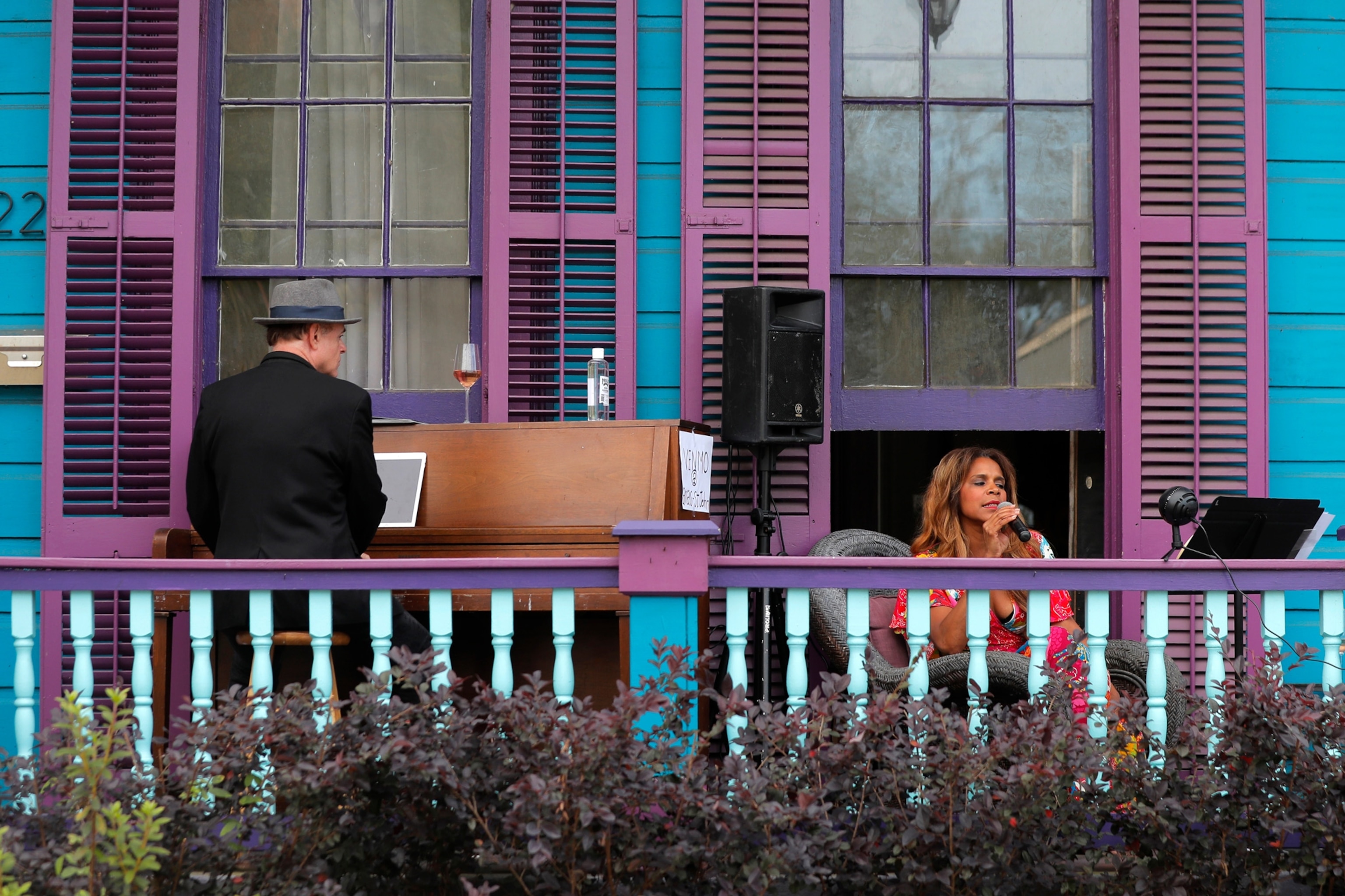 Musicians perform a front porch concert in New Orleans.