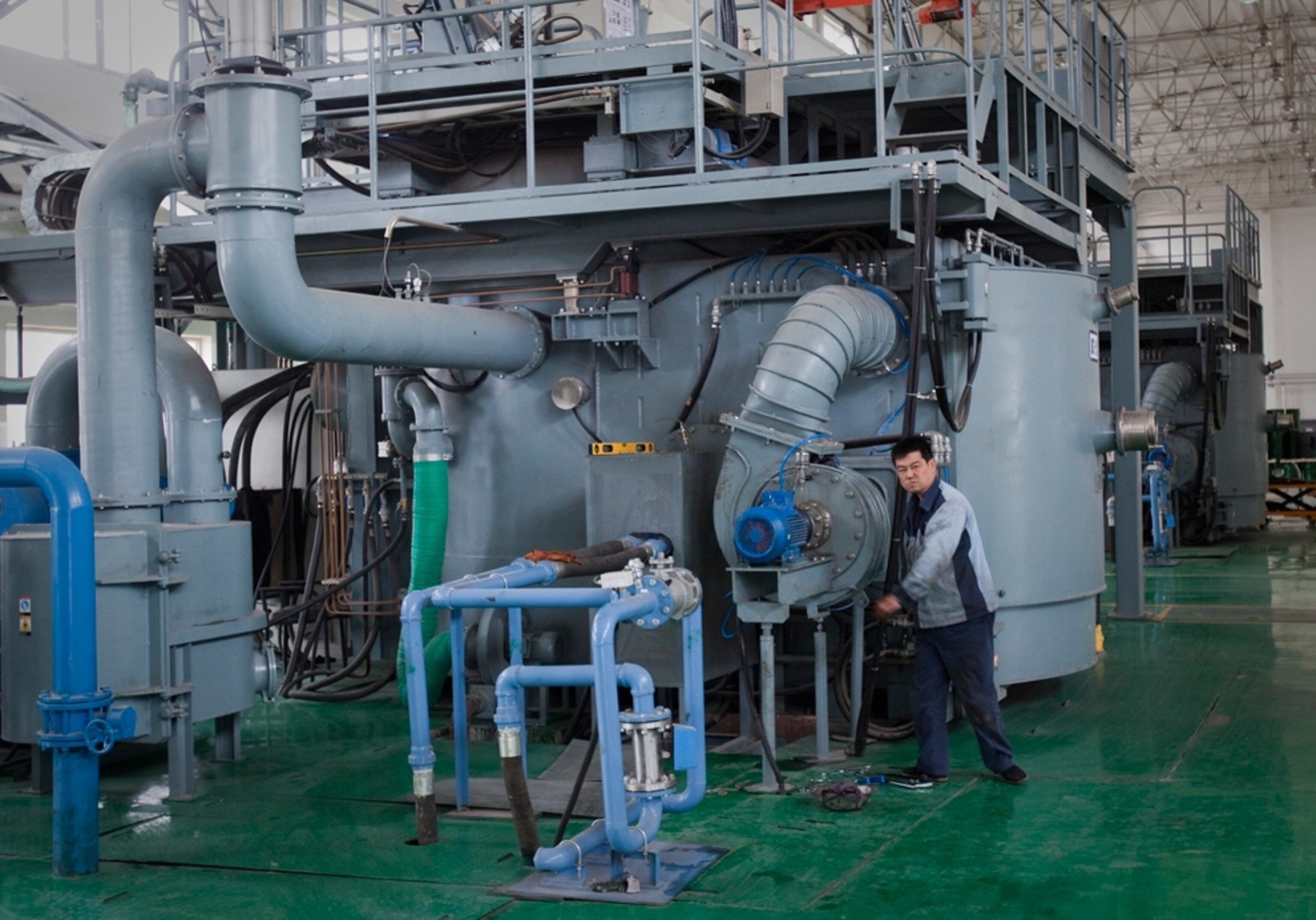 Technicians at rare-earth production plant, Inner Mongolia