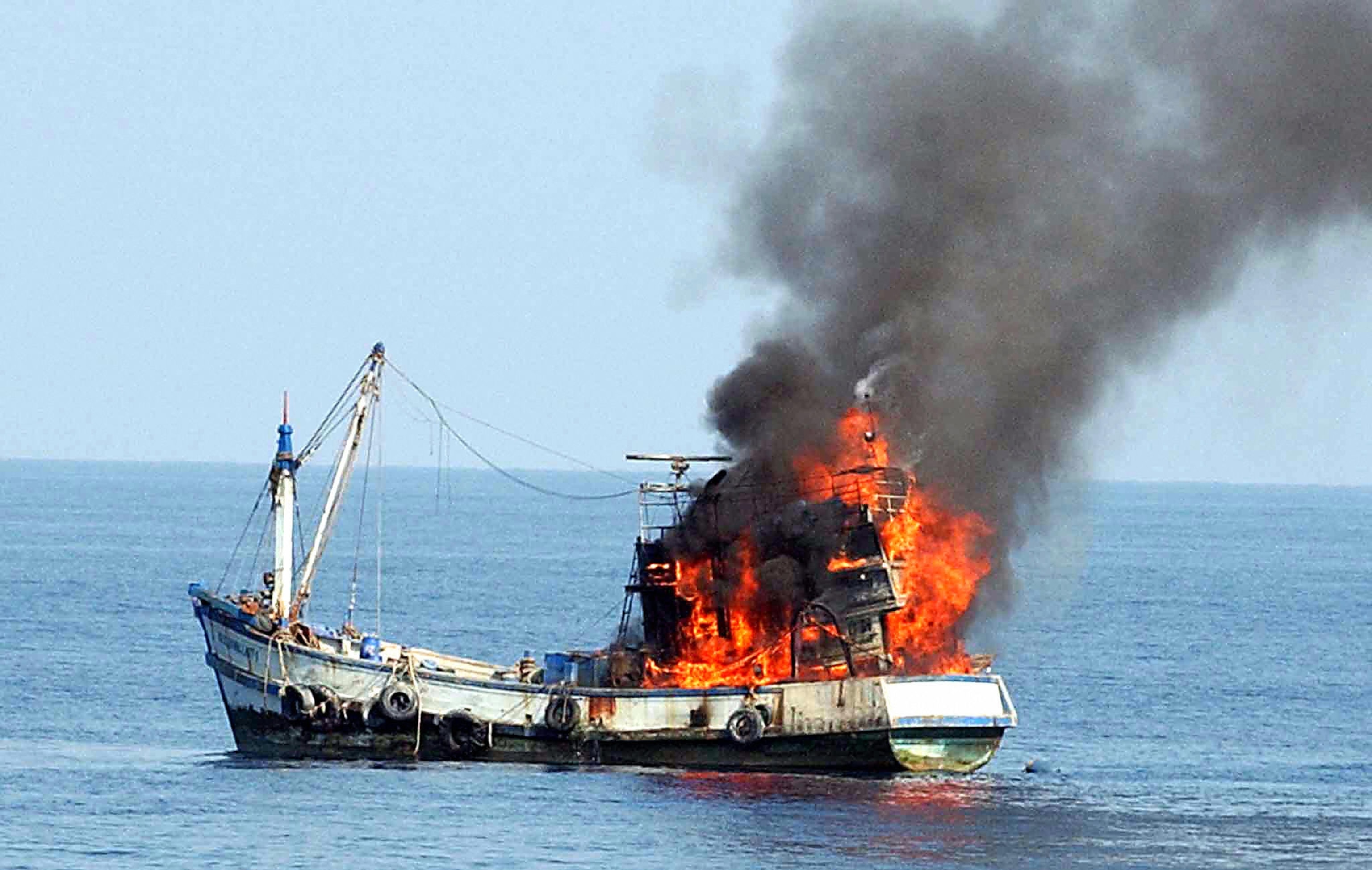 Thai fishing boat sends up black smoke