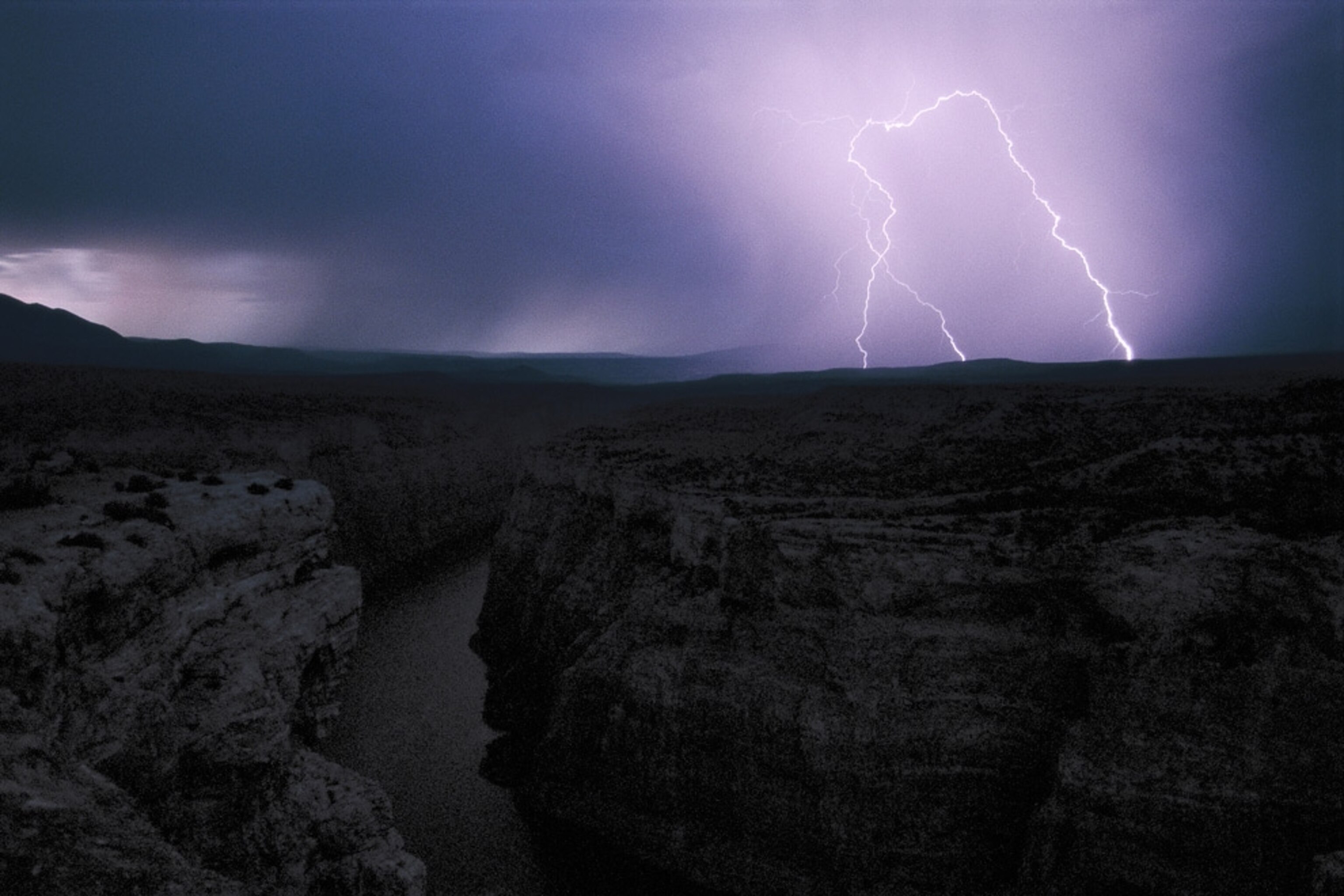 how far can gamma travel in air A view of a lightning strike.