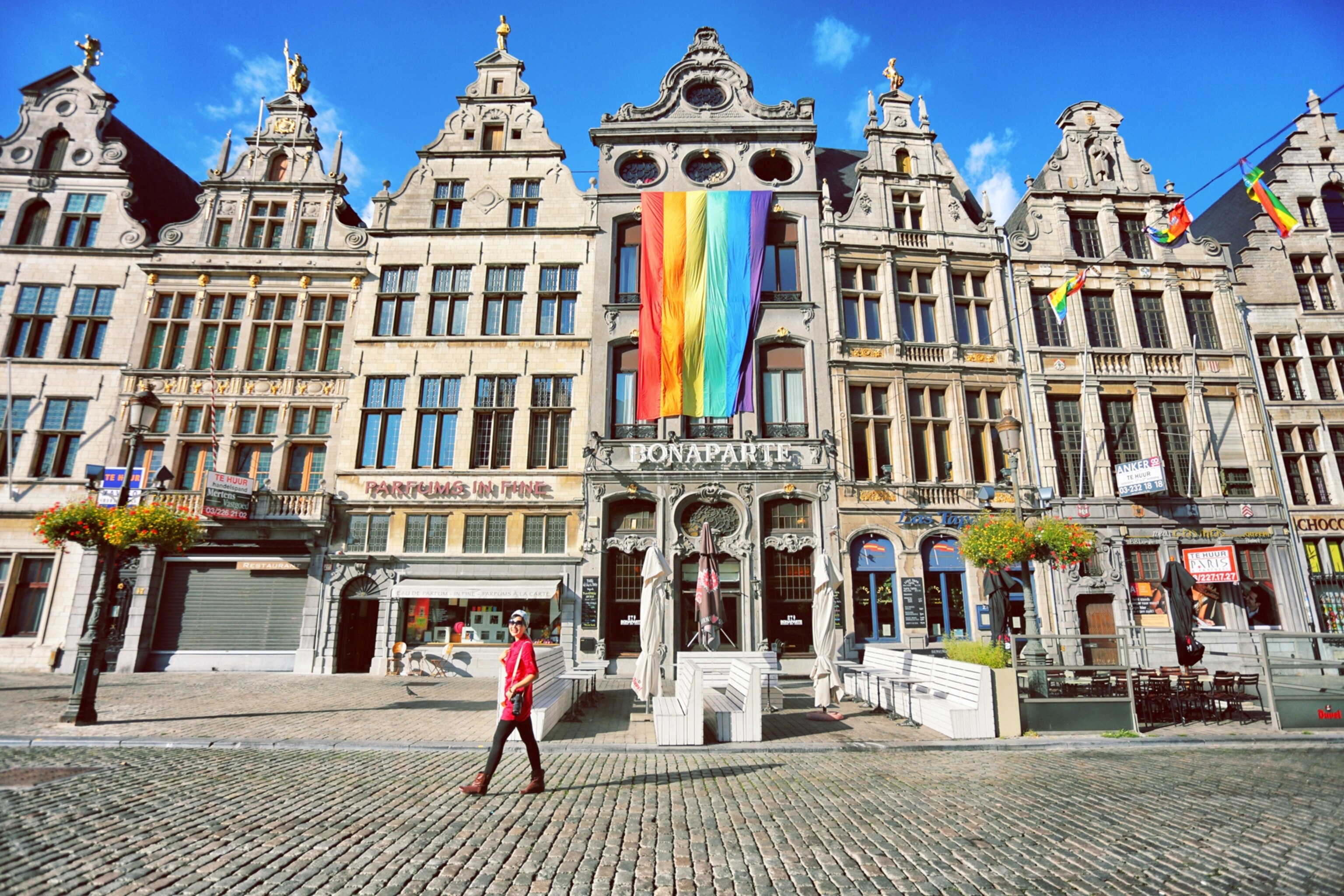 a A Pride Flag adorns city hall in Antwerp Belgium