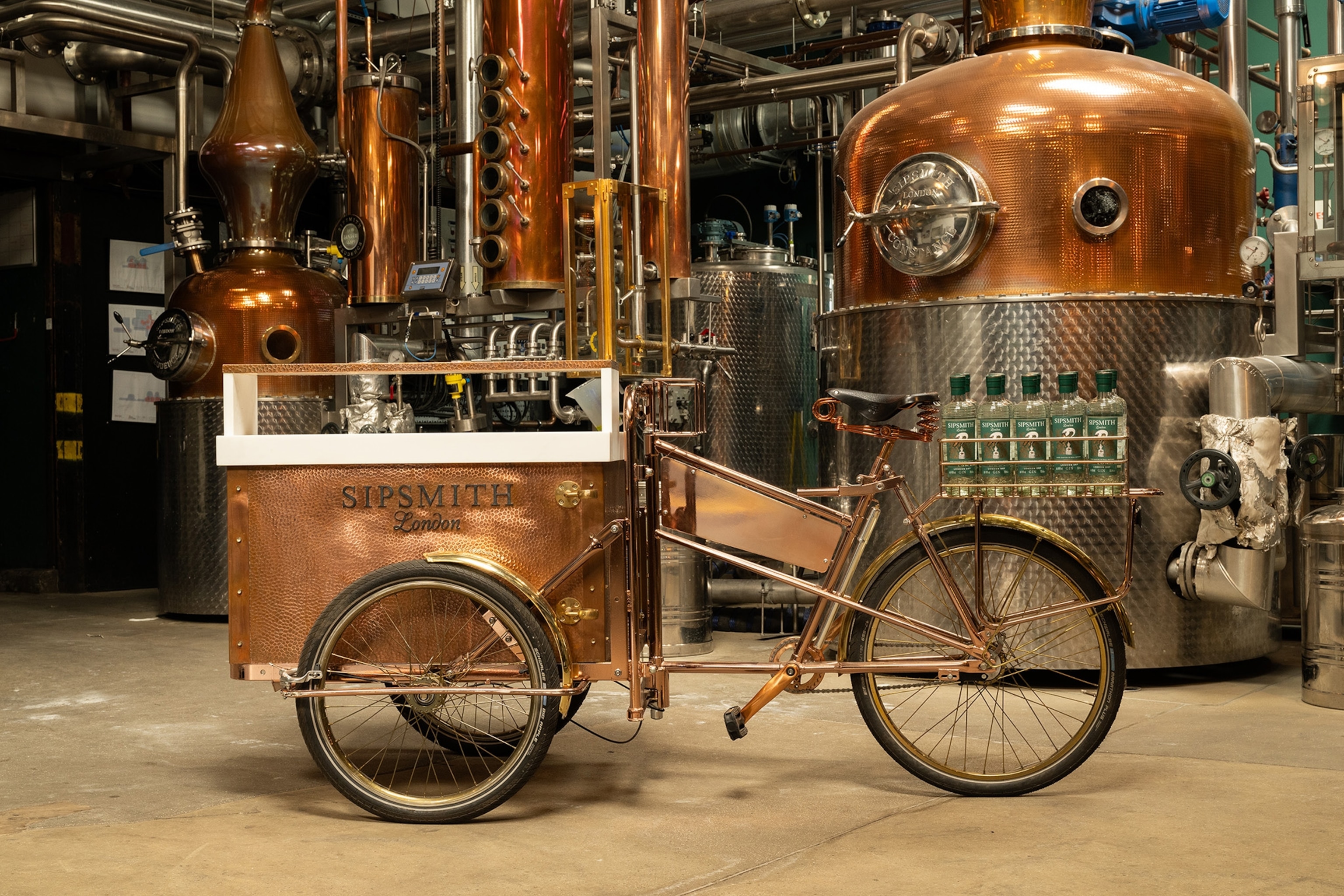 An old-fashioned bicycle converted into a gin cart