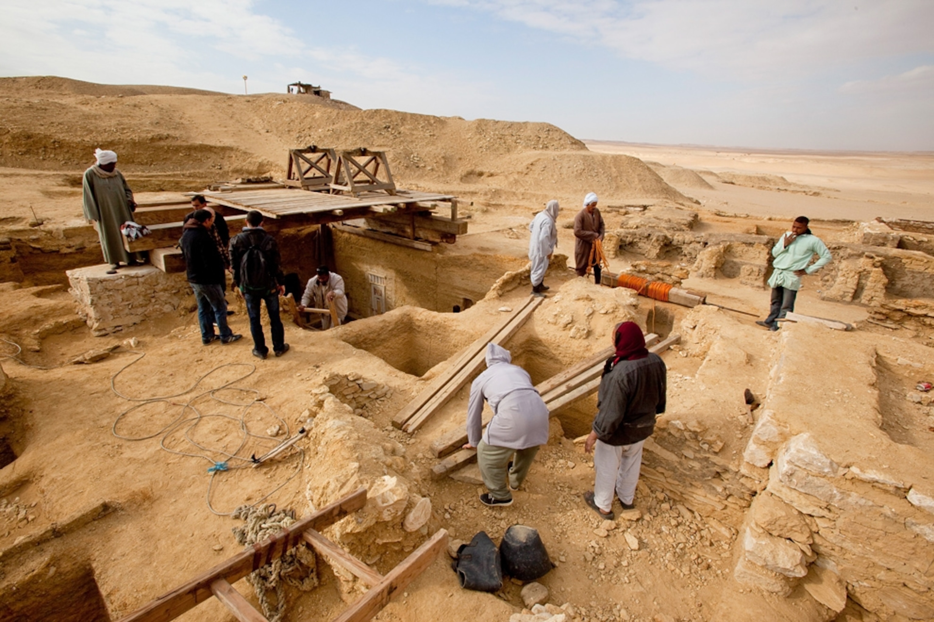 workers at the site of two newfound ancient Eyptian tombs.
