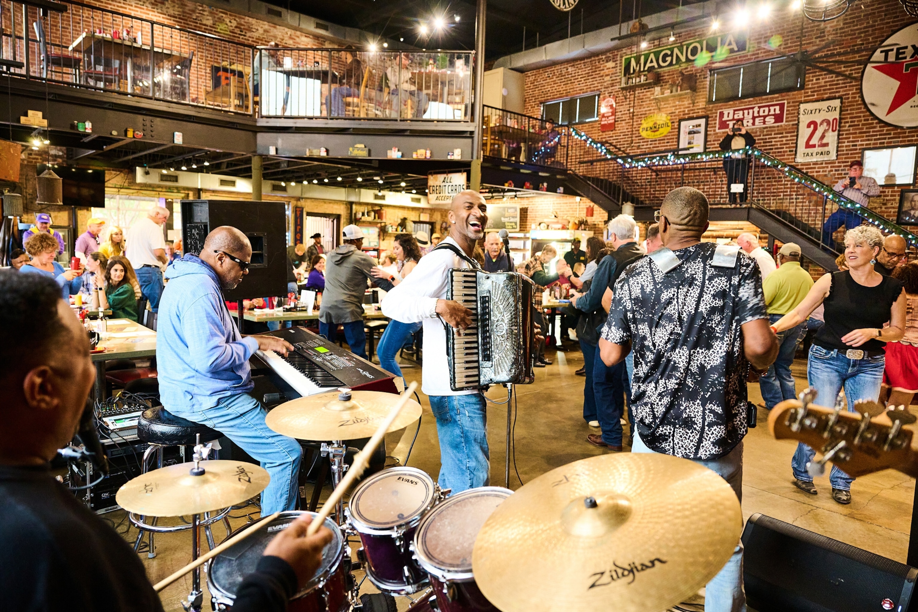 Patrons dance to the music provided by the band at Buck & Johnny's in Breaux Bridge, La., on Nov. 11, 2023. Acadiana, often called Cajun Country, is a 14,500-square-mile region in the belly of southern Louisiana, a couple of hours drive west from New Orleans.