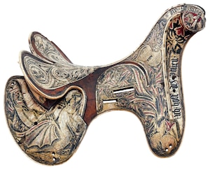 A 1440 saddle is pictured bearing the symbol of the Order of the Dragon. It's housed at the Royal Armouries Museum in Leeds, England.