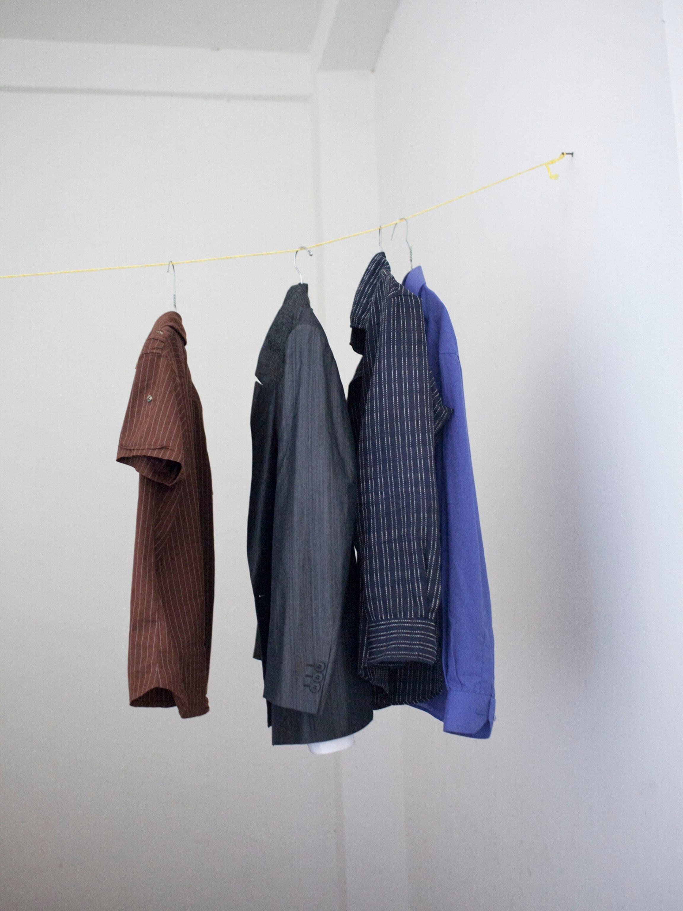 shirts hanging on a string