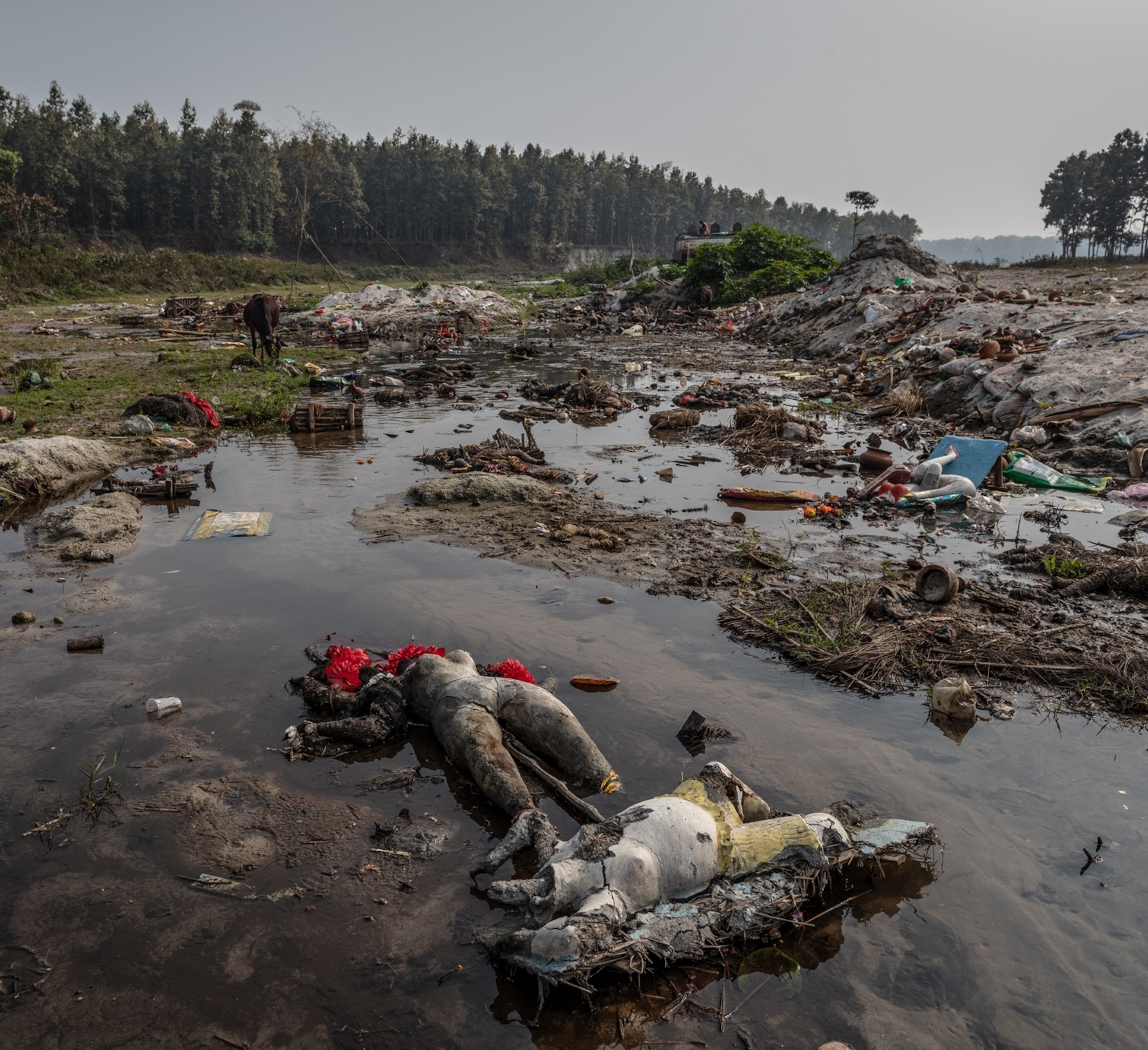 figurines resembling mutilate dead bodies.